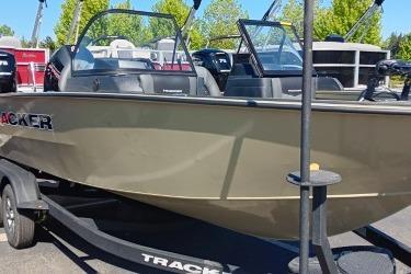 2026 Tracker Targa V-19 Combo boat on trailer, parked outdoors.