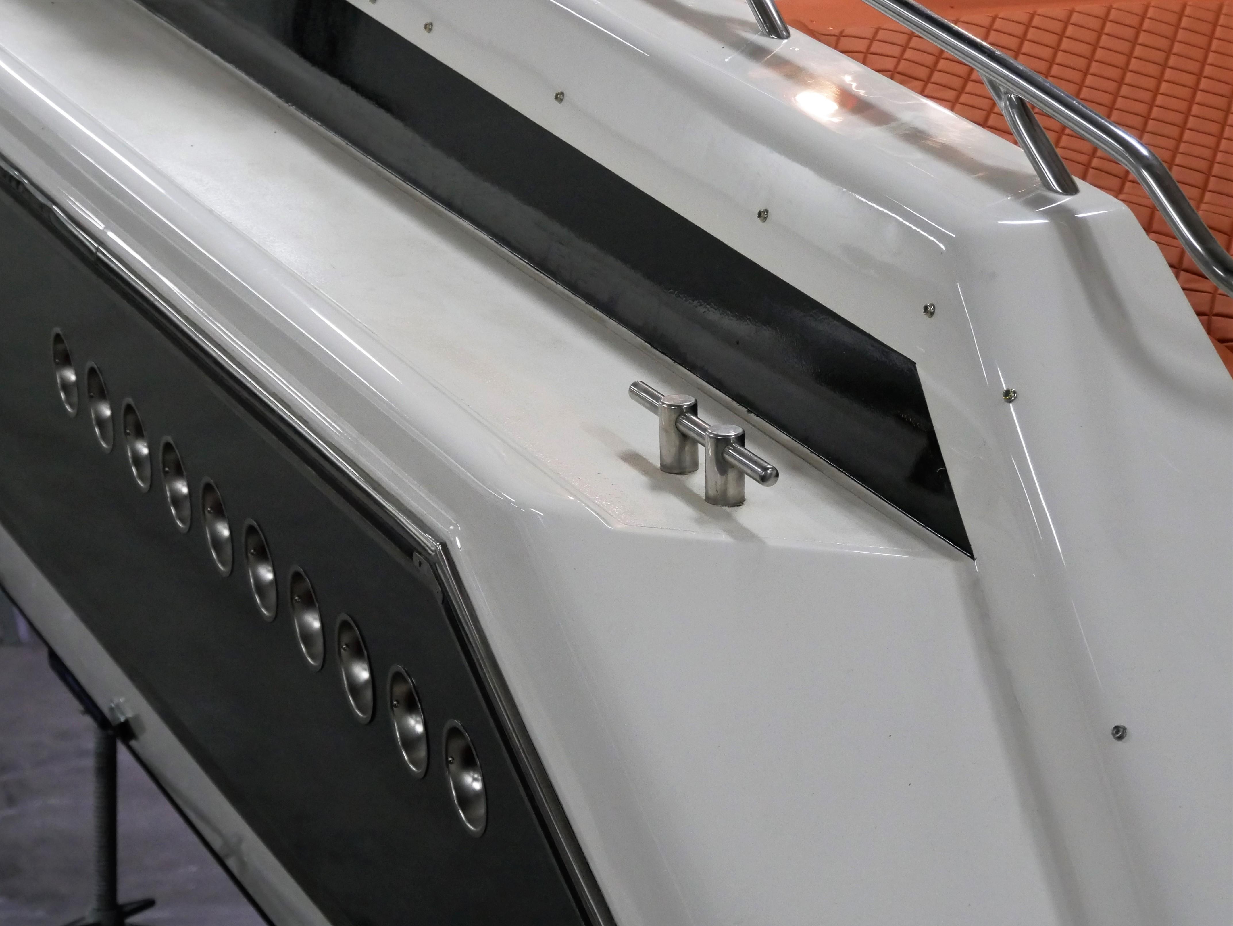 1991 Sunseeker Thunderhawk 43 boat detail with sleek white exterior and metal fittings.