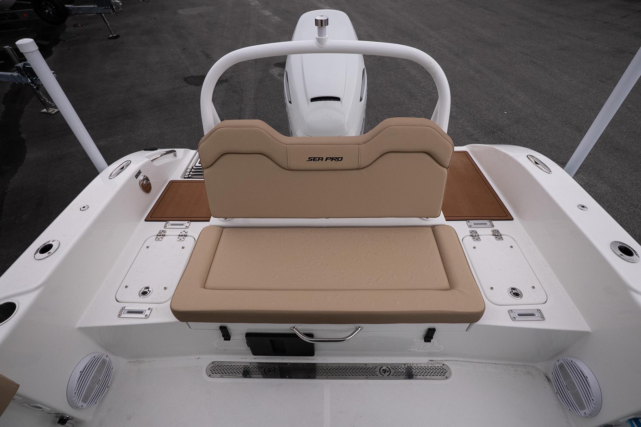 2026 Sea Pro 245FLXR Sandbar boat with tan seating and white deck.