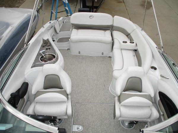 Interior of a 2015 Crownline 285 SS boat with white seating.