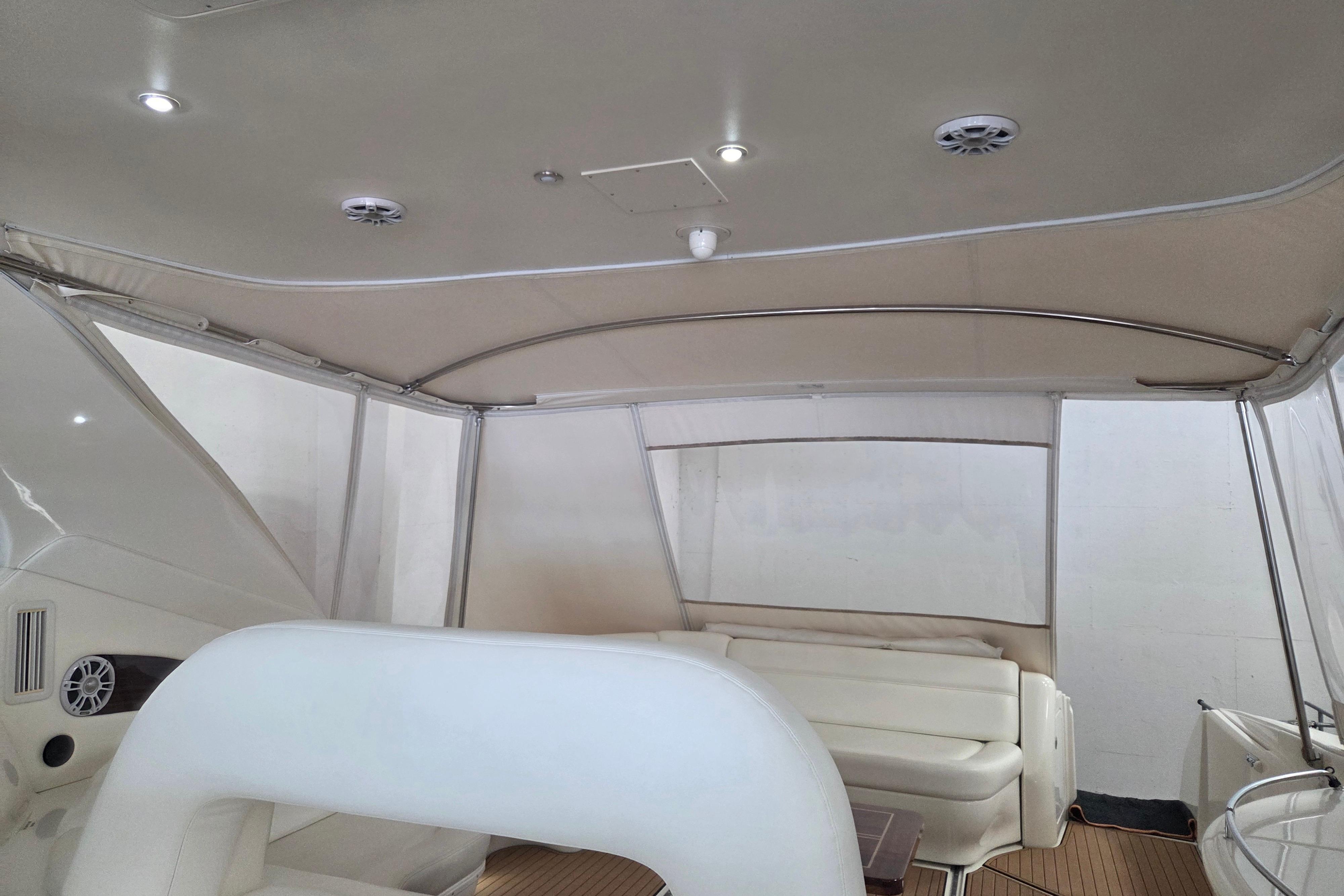 Interior view of 2000 Sea Ray Sundancer 540 yacht with seating and canopy.