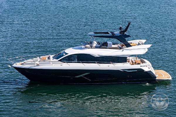 2025 Sunseeker Manhattan 68 luxury yacht on calm water.