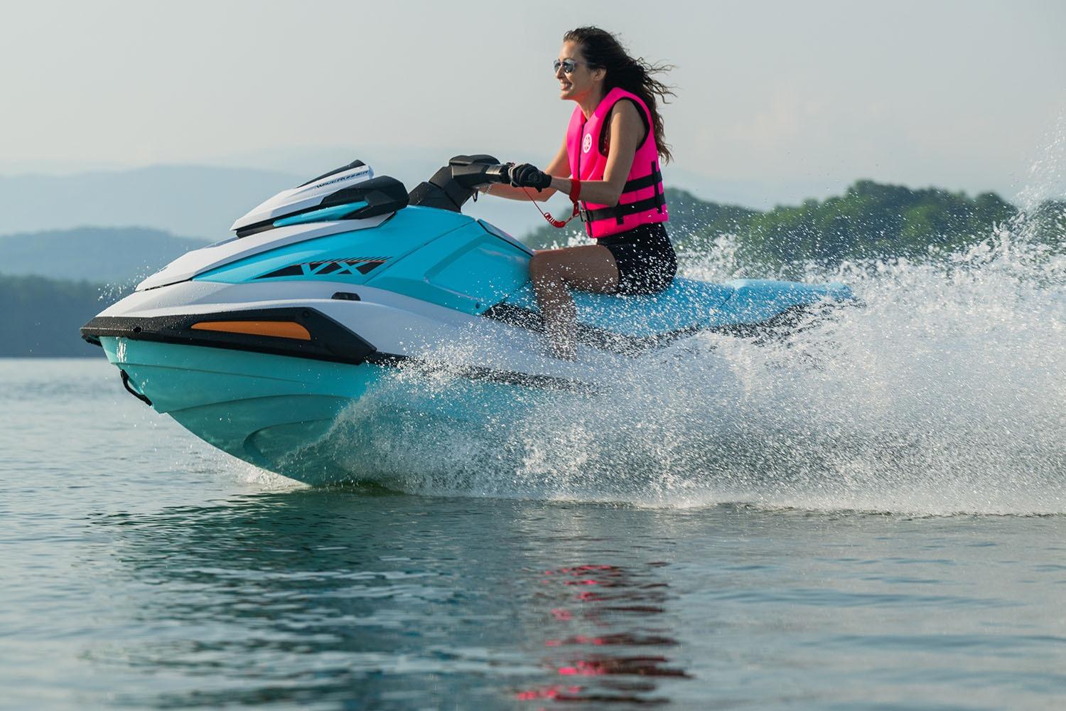 Manufacturer Provided Image: 2026 Yamaha WaveRunner VX jet ski on water, woman riding, wearing pink life vest.