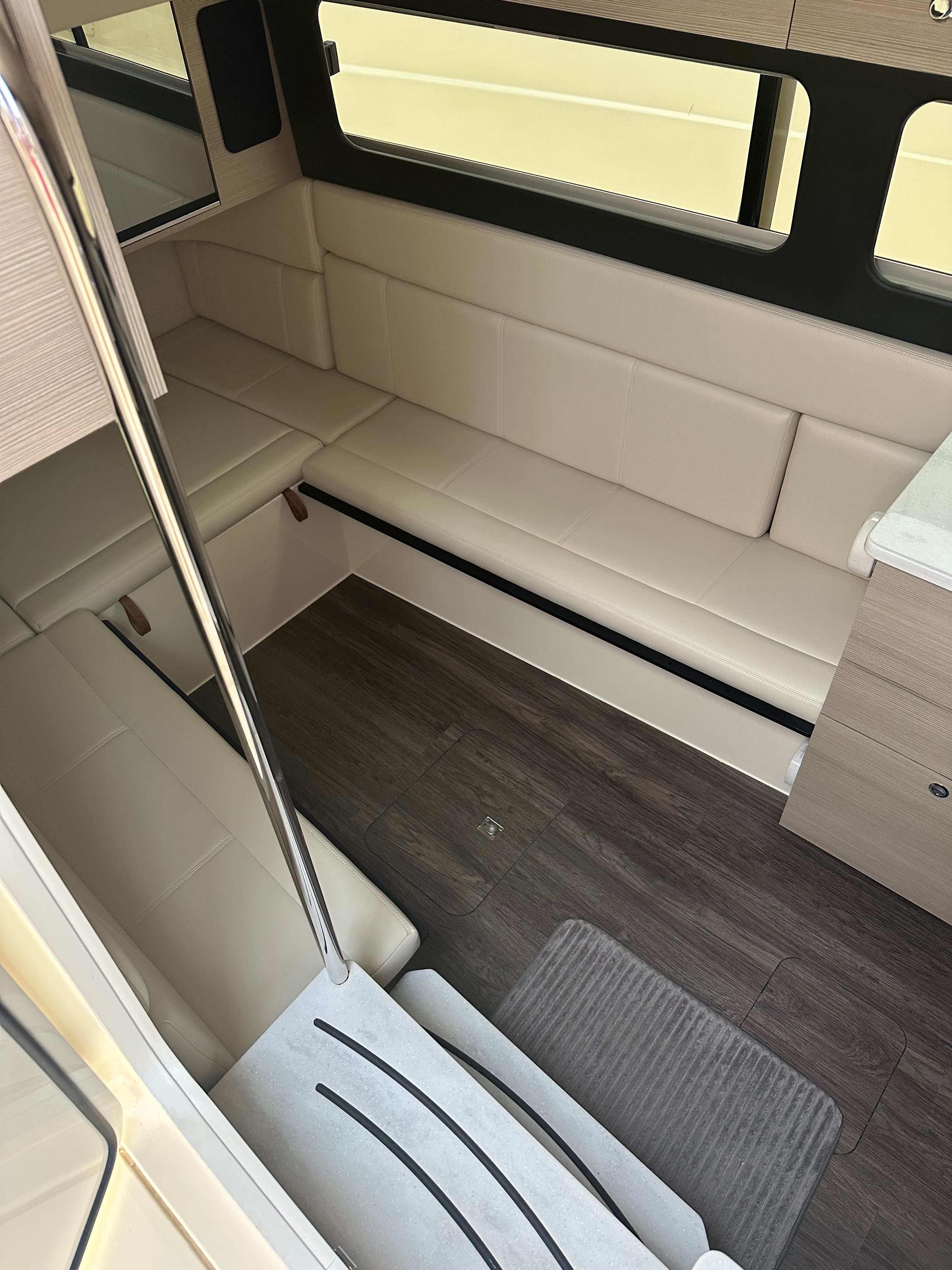 Interior of 2022 Scout 425 LXF yacht with sleek seating.