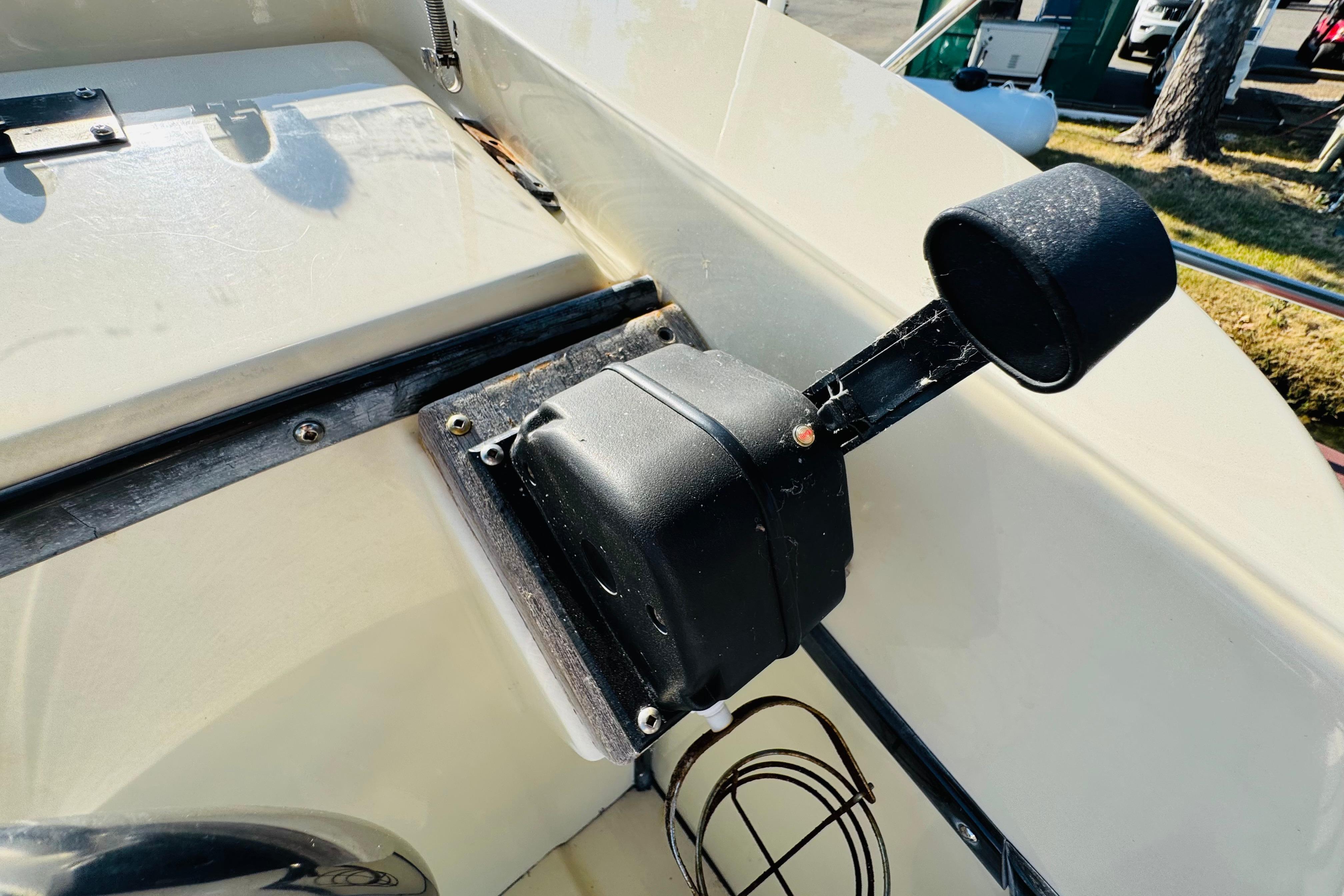 Close-up of a 1996 Nordic Tug 32 boat component, featuring a black mechanical part.