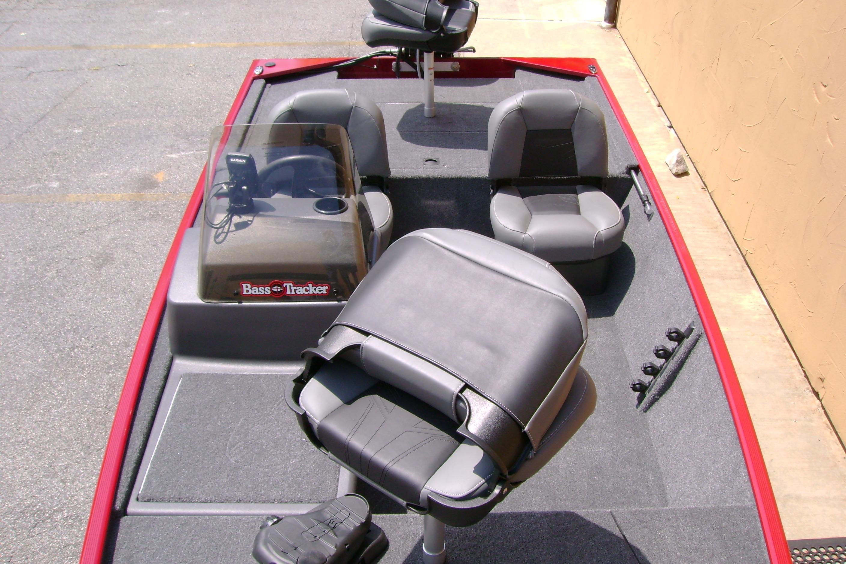 2026 Tracker Bass Tracker Classic XL boat interior with seating and steering console.