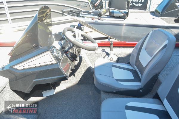 2024 Lowe Stinger 195 Bass boat interior with steering wheel and seats.