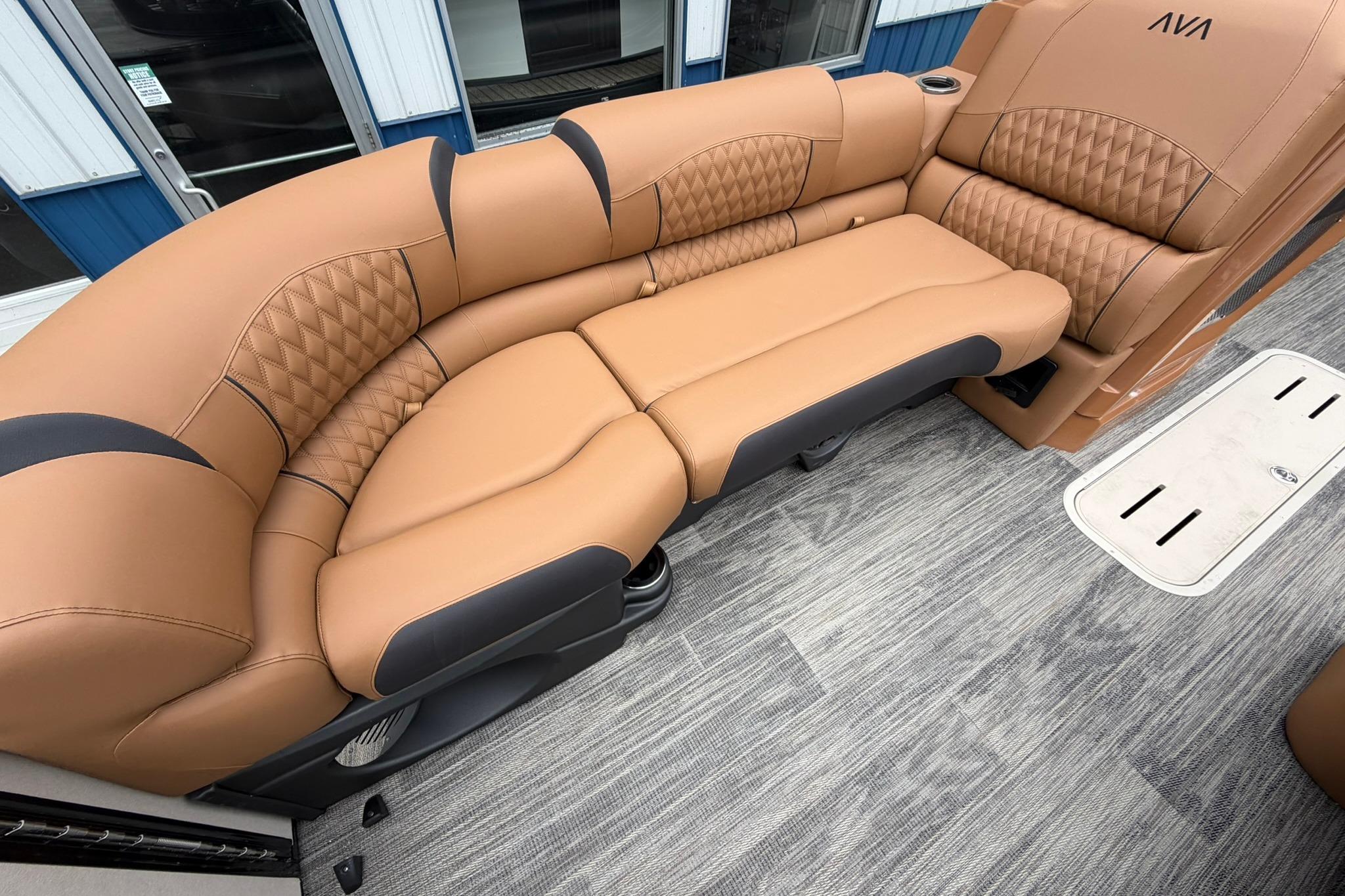 Luxurious tan seating on 2026 Avalon Catalina Quad Lounge Shift boat.