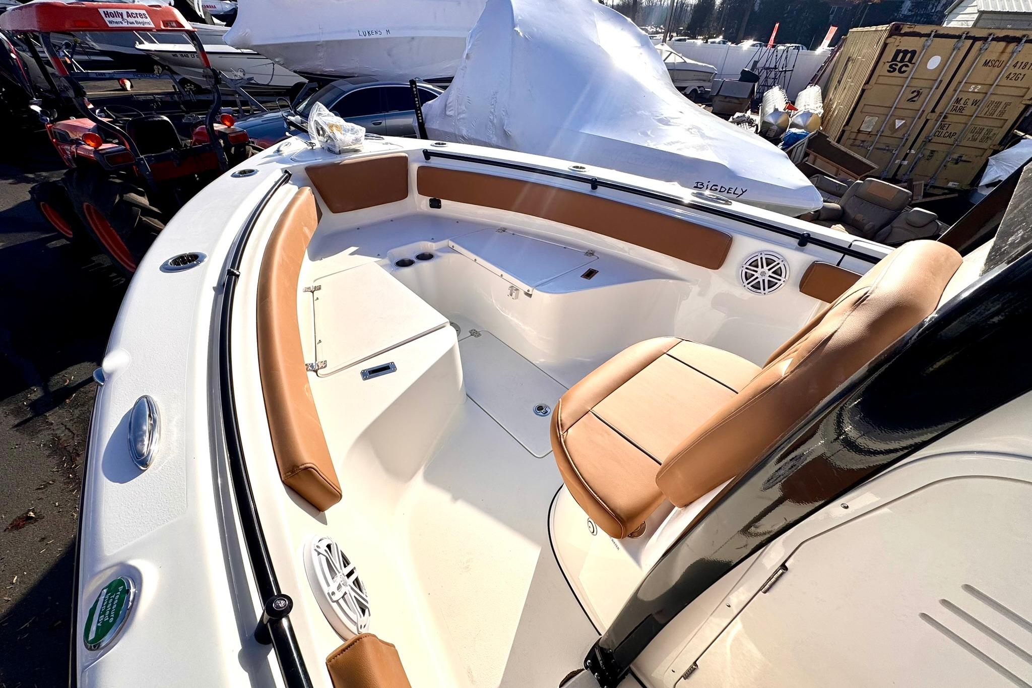 2026 Key West 239 FSR boat interior with tan seating and modern design.