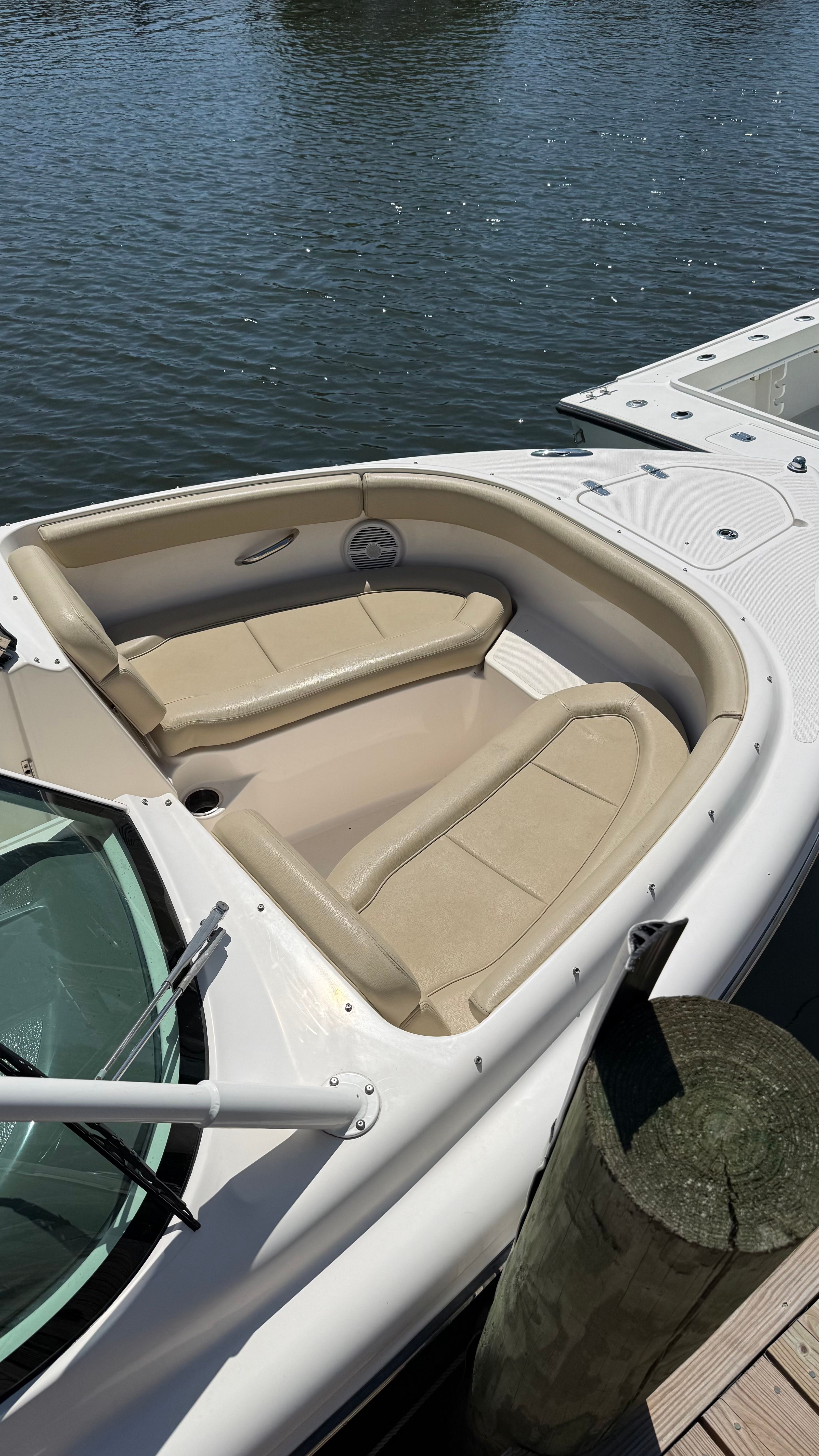 2016 Pursuit DC 265 Dual Console at the dock.