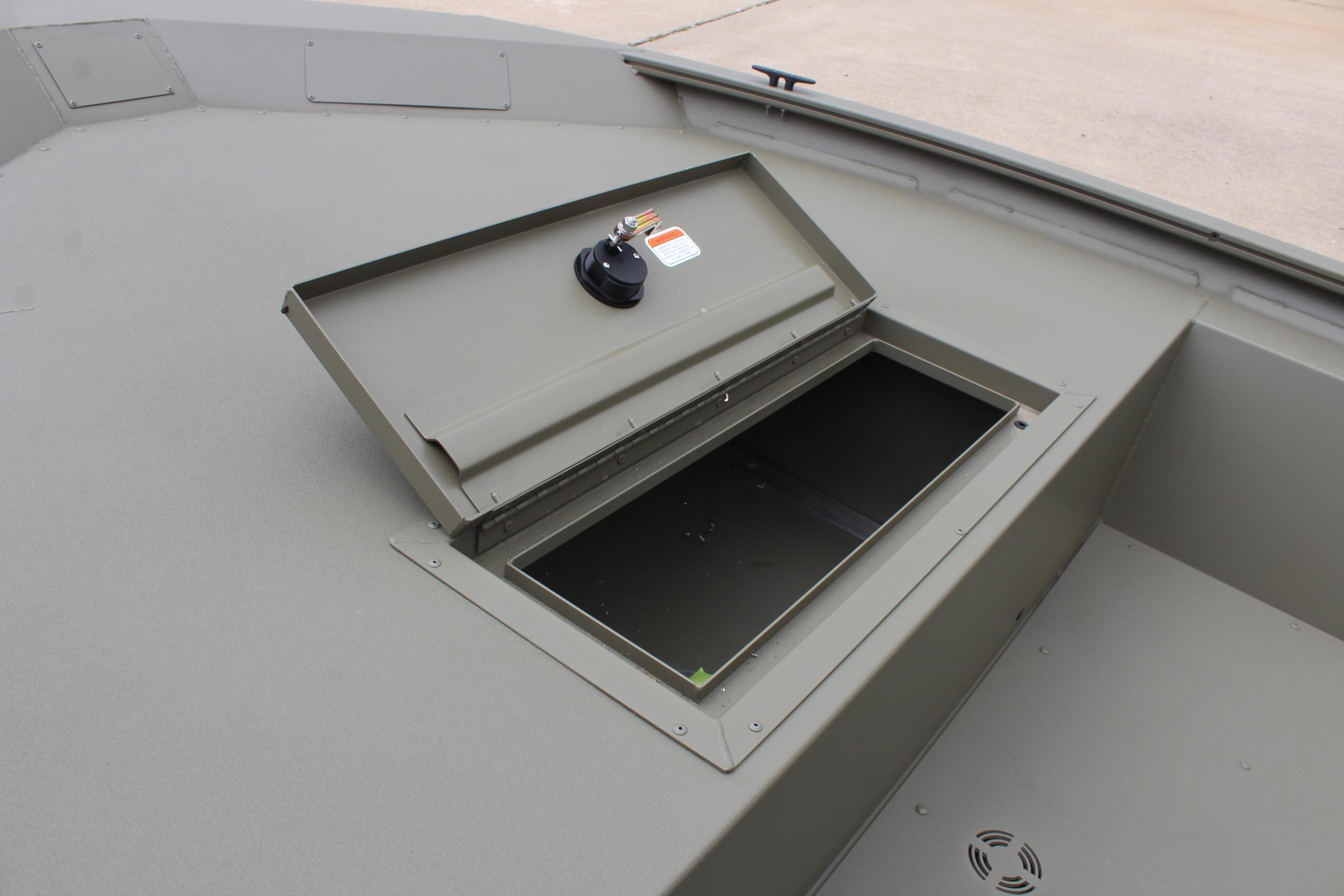 Open storage compartment on 2026 Tracker Grizzly 1754 Utility boat deck.