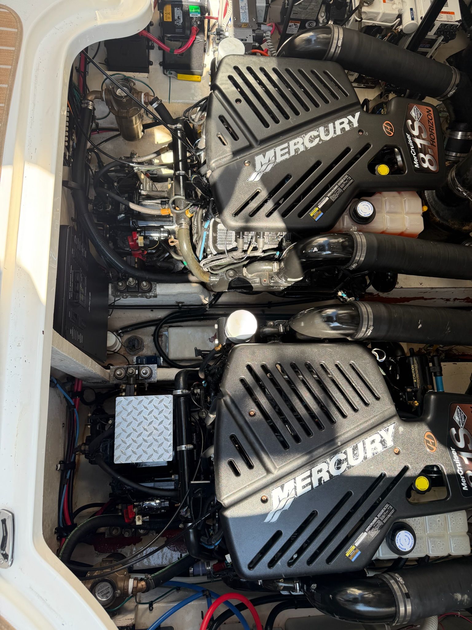 Engine room of a 2007 Sea Ray 340 Sundancer with Mercury engines.