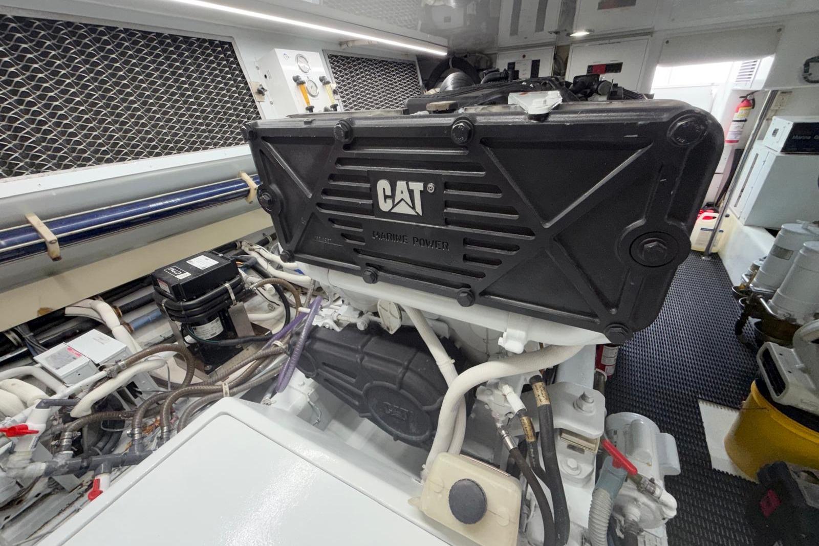 Engine room of 2003 Hatteras 54 Convertible with CAT marine power engine.