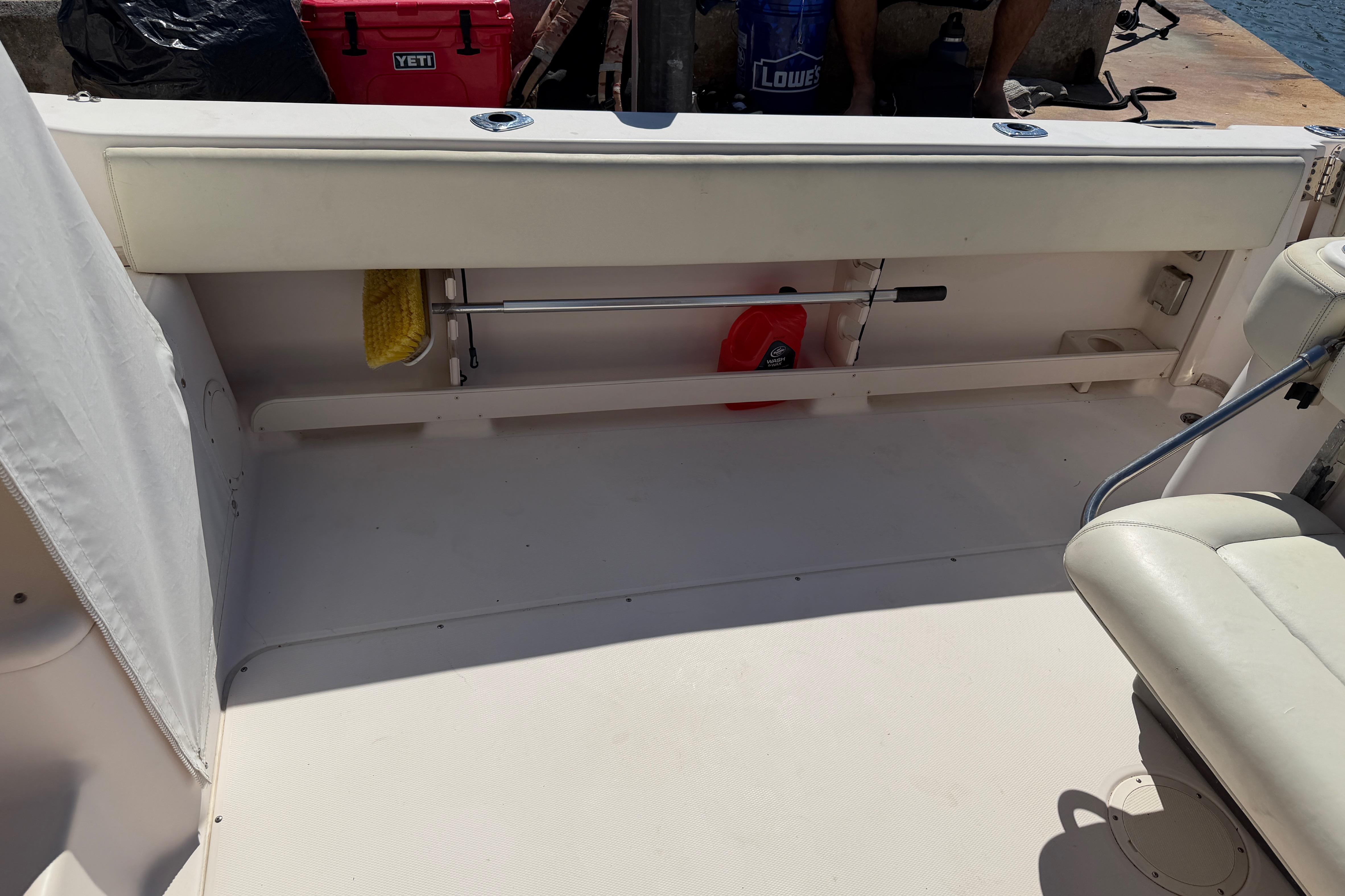 2006 Grady-White Sailfish 282 boat interior with storage and seating area.