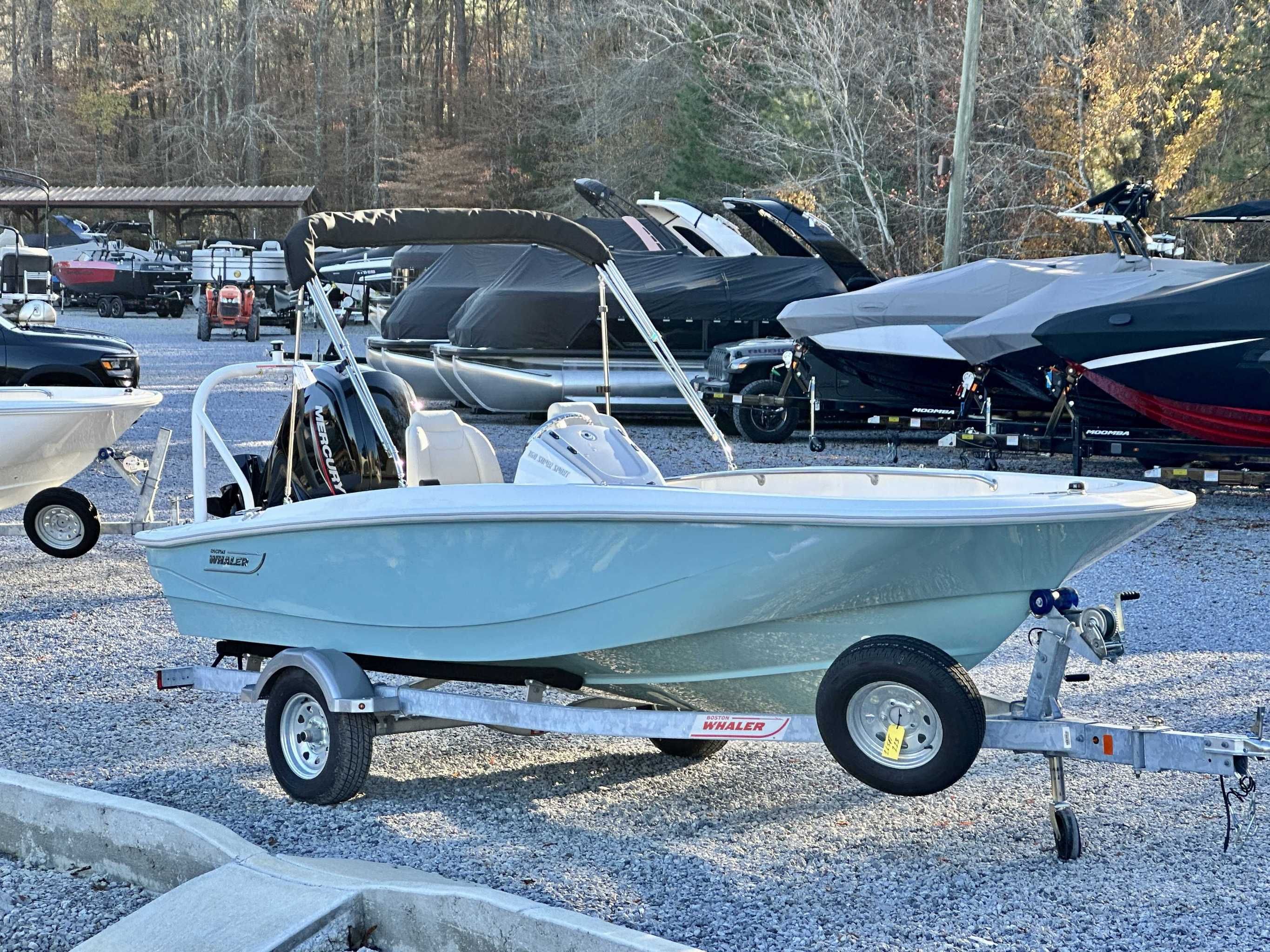 2025 Boston Whaler 160 Super Sport on trailer outdoors.