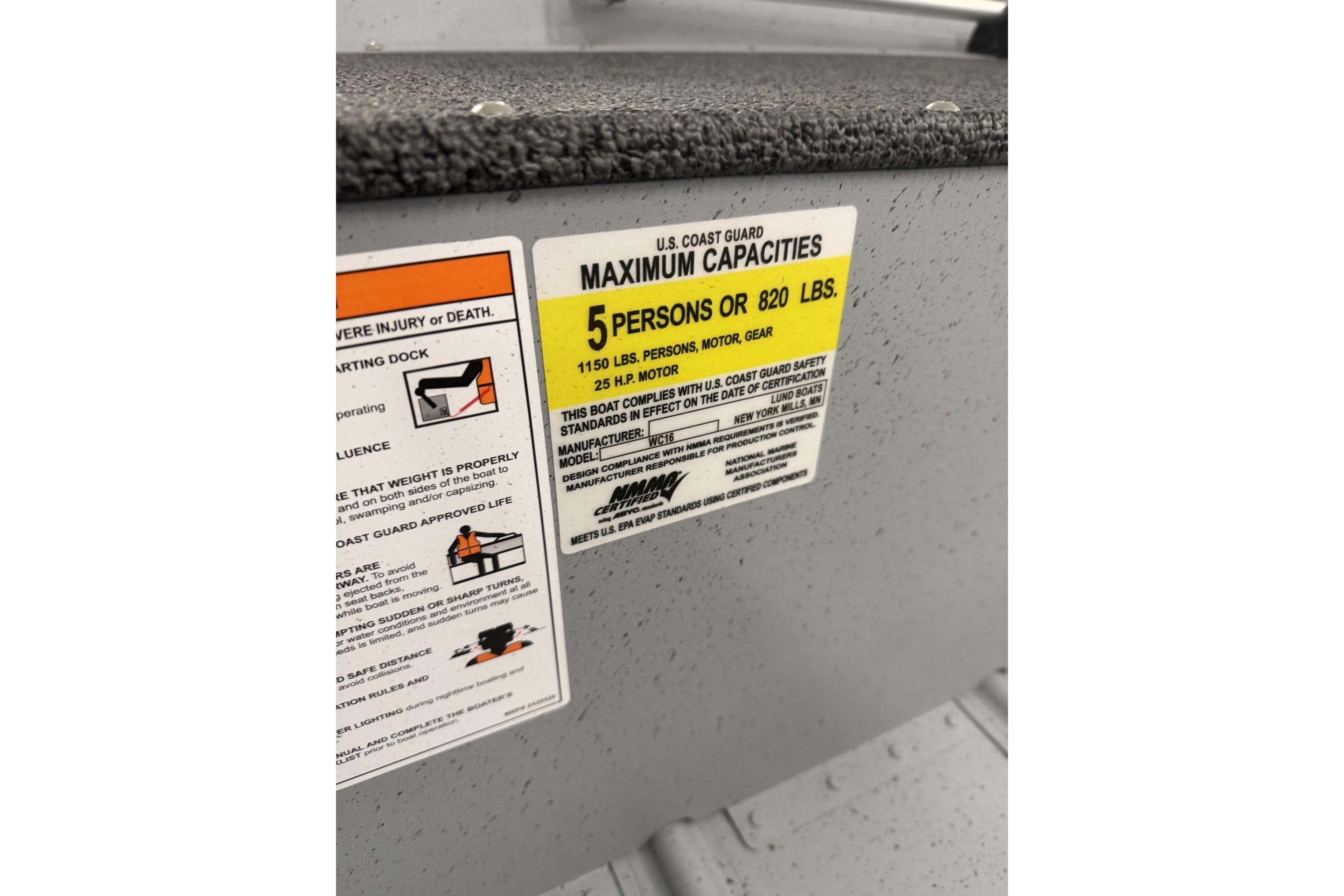 Capacity label on 2027 Lund WC 16 boat, max 5 persons or 820 lbs.