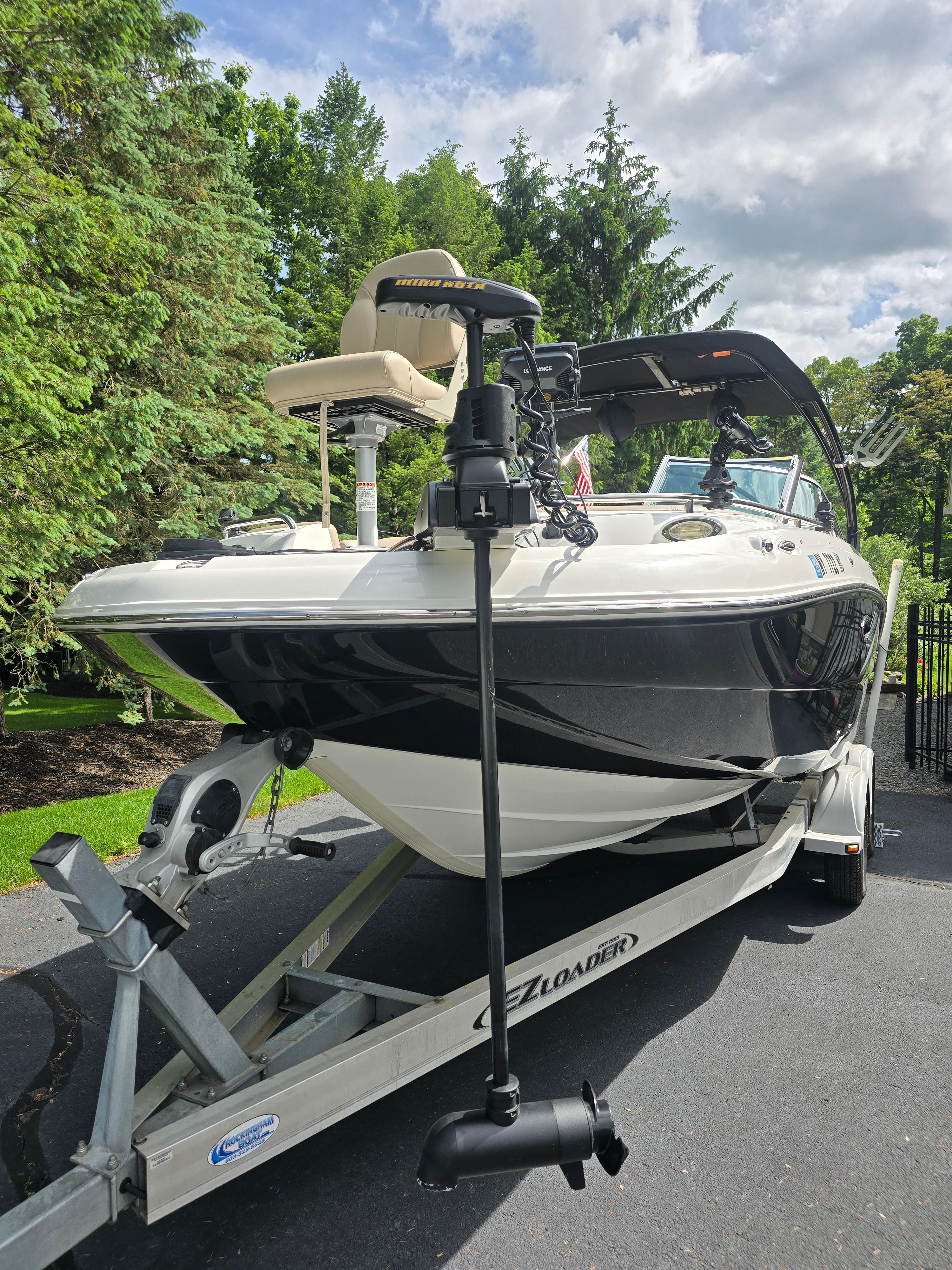 2016 Hurricane SD 2200 boat on trailer outdoors.