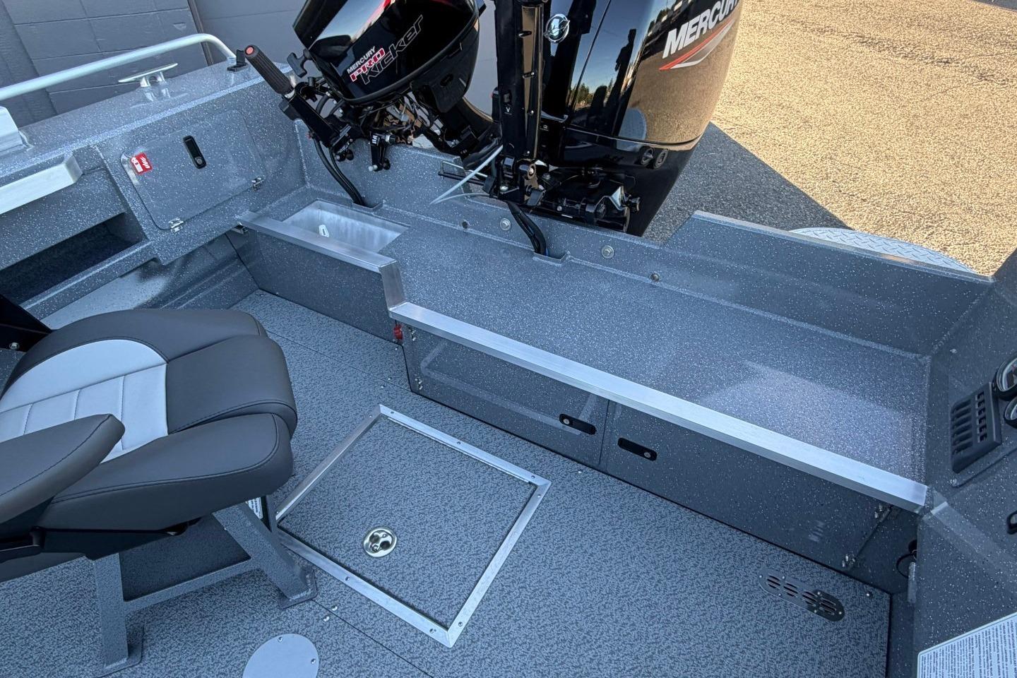Interior of 2026 Thunder Jet 209 Rush OT boat with Mercury engine and seating.