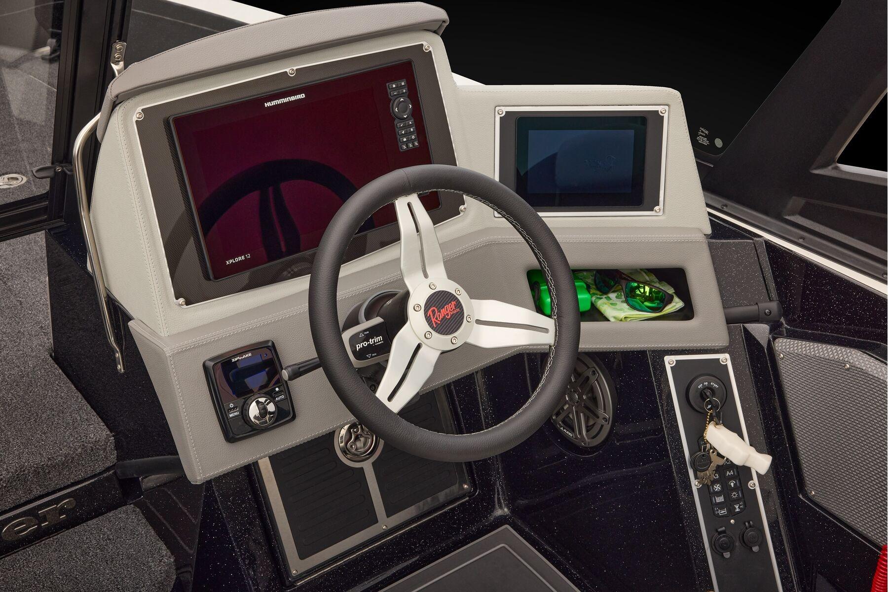 Manufacturer Provided Image: 2026 Ranger 620xFS Pro boat dashboard with steering wheel and electronic displays.