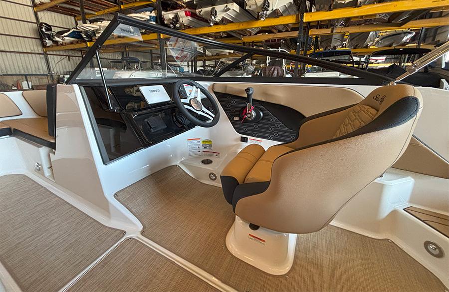 2025 Sea Ray SPX 190 Outboard boat interior with tan seating and modern dashboard.