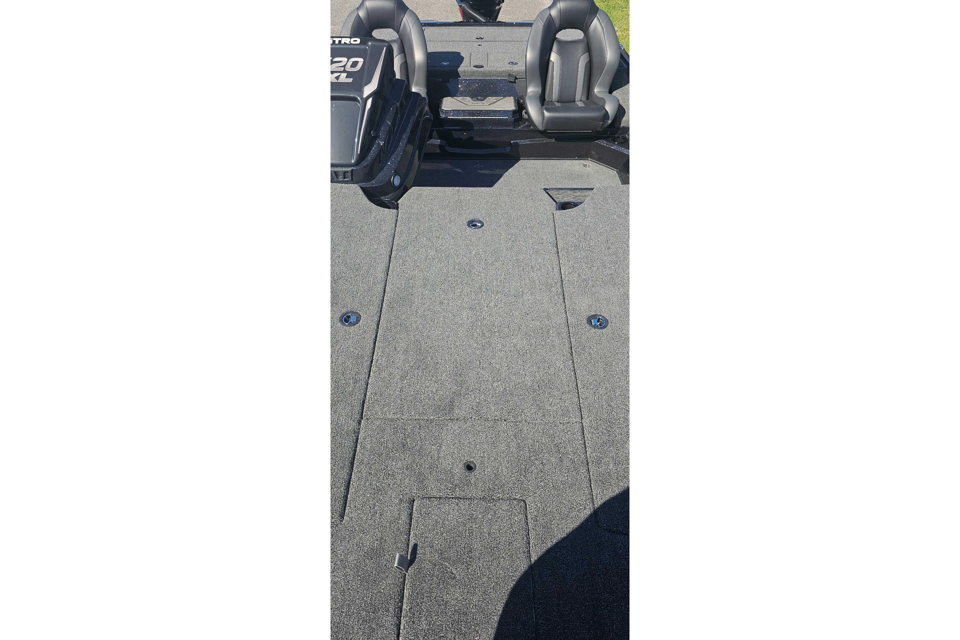 2026 Nitro Z20 XL Pro boat interior with seating and carpeted deck.