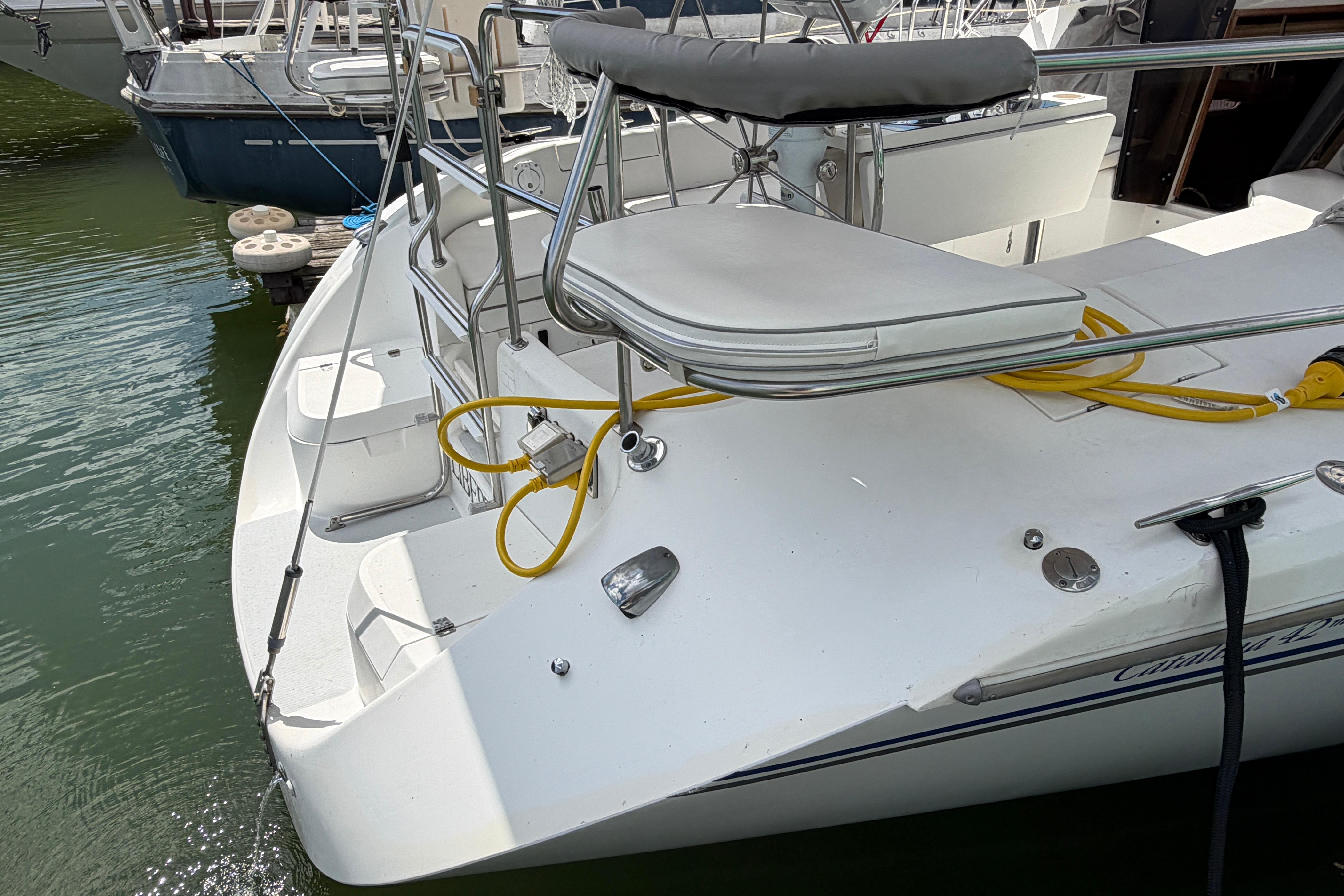 Catalina 42 MkII sailboat, 2001 model, docked with visible deck and railing.
