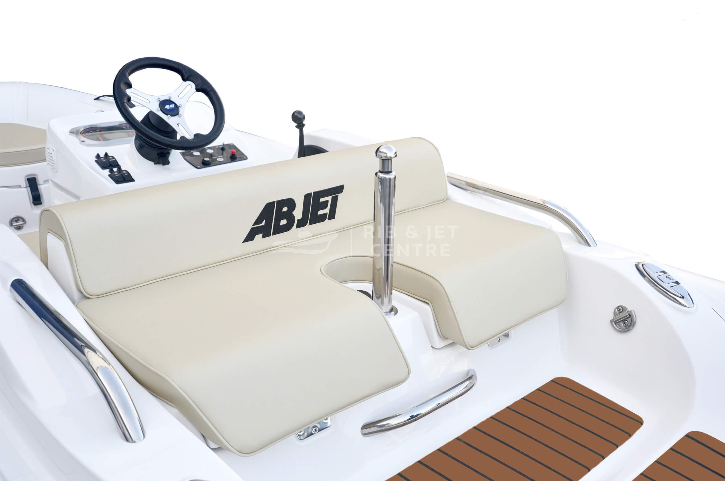 2023 AB Inflatables ABJET 350XP boat interior with beige seating and steering console.