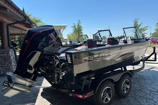 2026 Ranger VX1888 WT boat on trailer, featuring sleek design and powerful outboard motor.