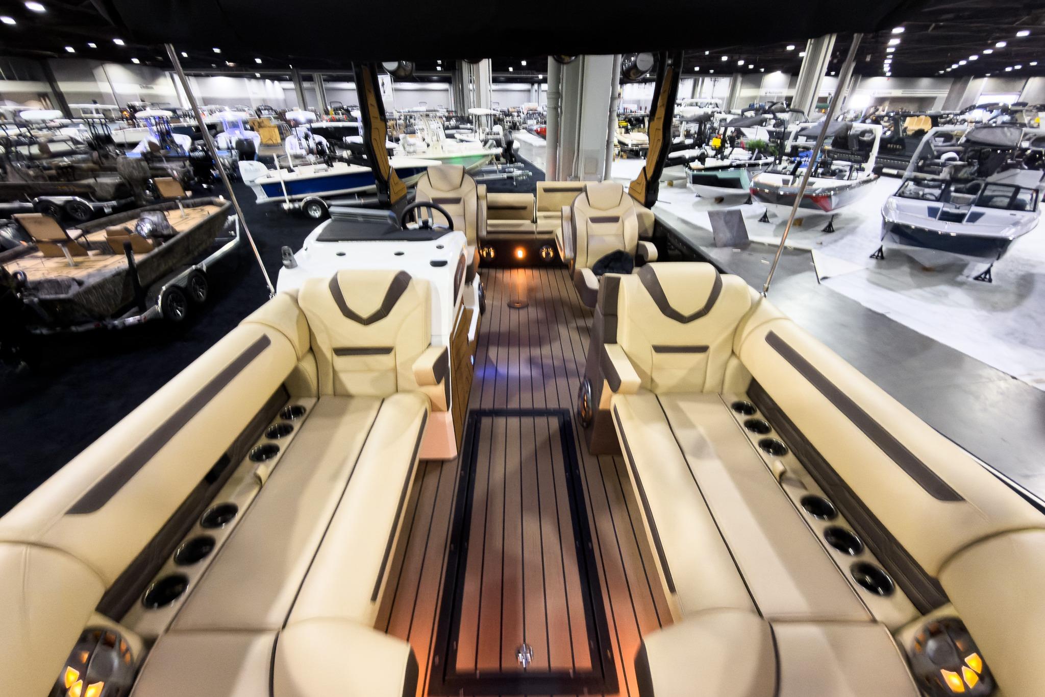 Luxurious 2026 Montara Surf Boss EVO boat interior at a boat show.