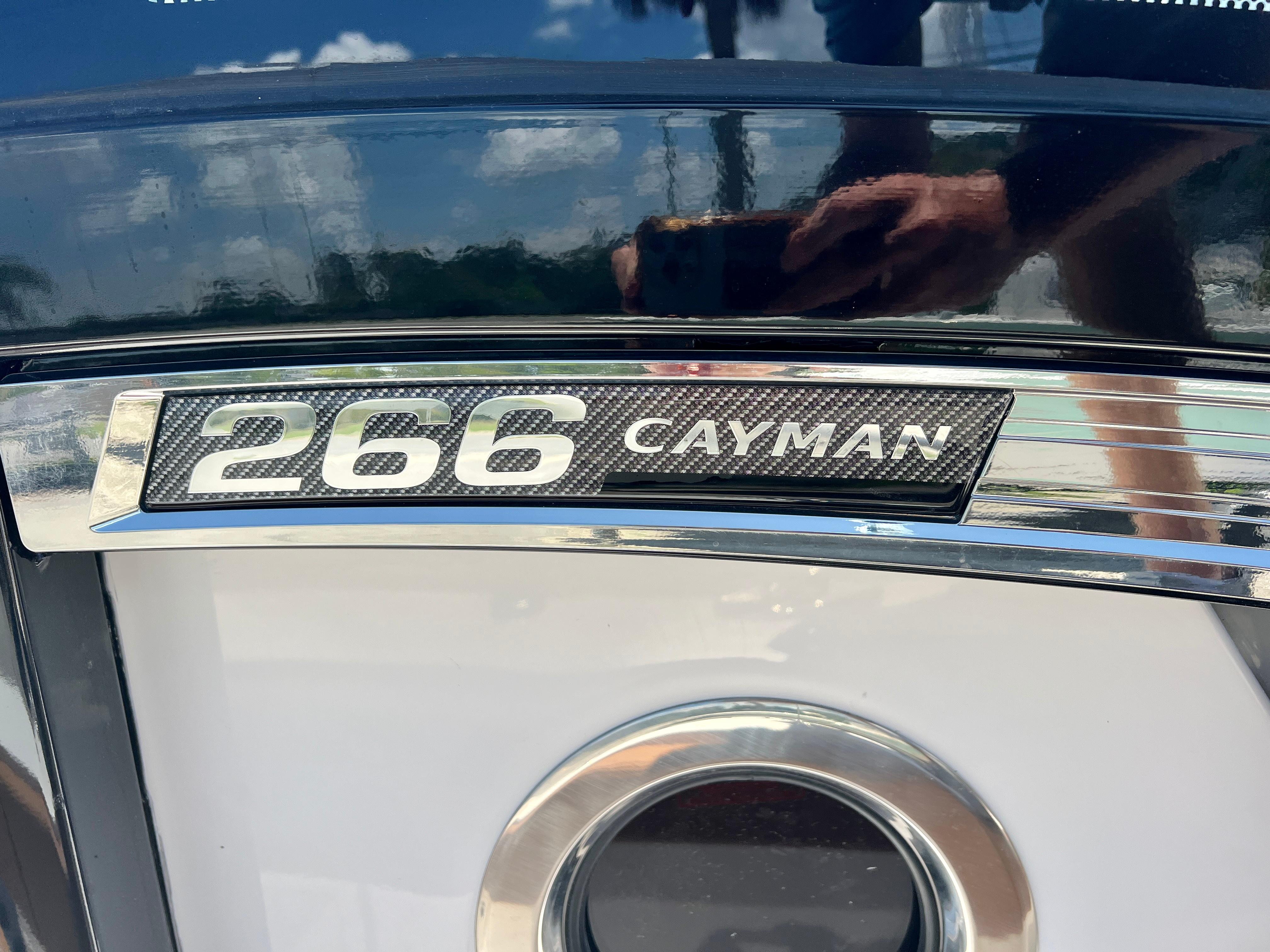 Close-up of 2025 Robalo 266 Cayman boat emblem.