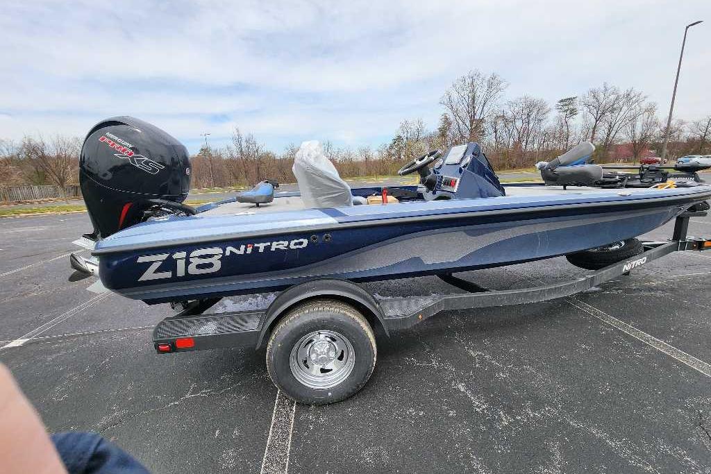 2026 Nitro Z18 Pro boat on trailer in parking lot.