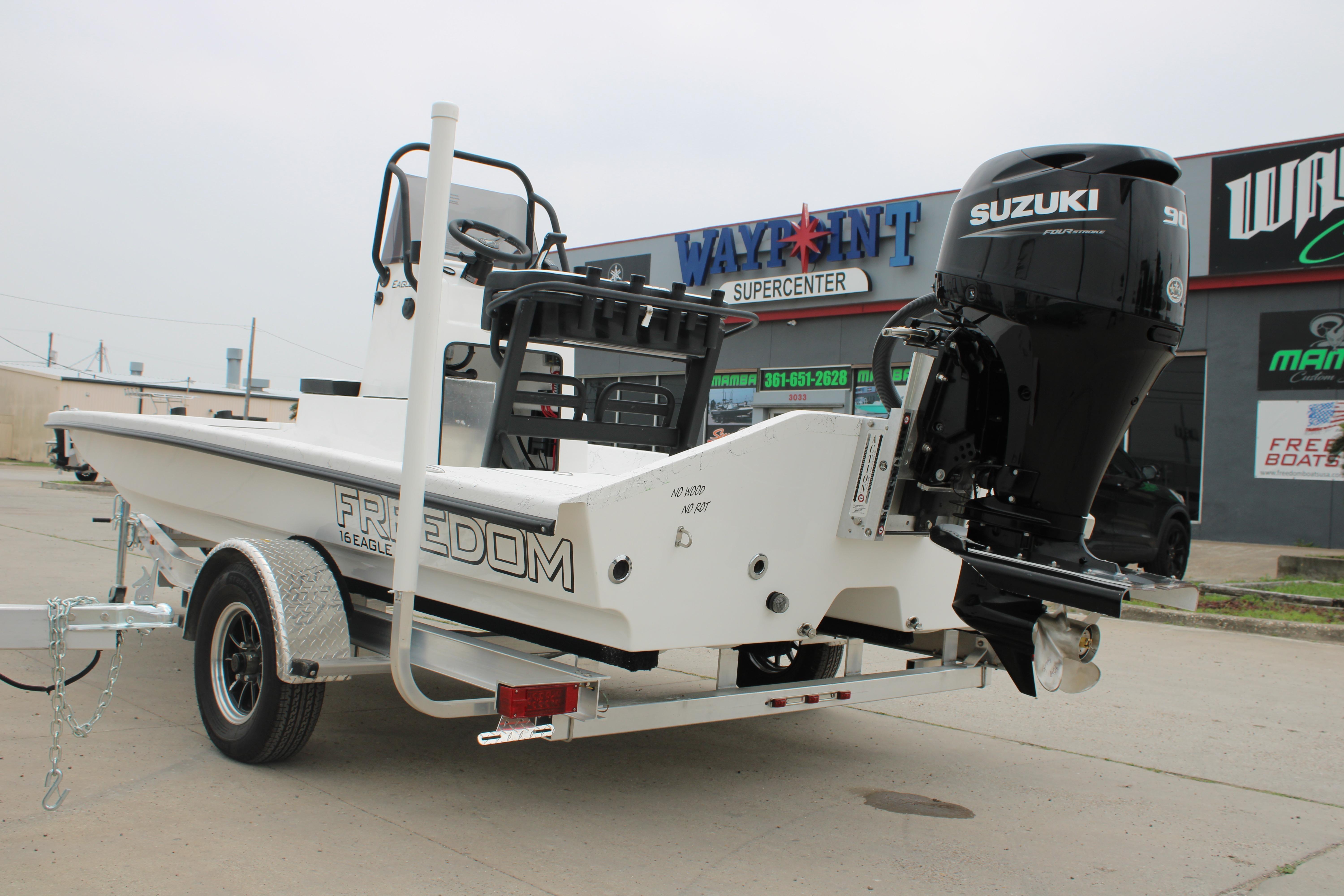2026 Freedom Boats 16' Eagle with Suzuki engine at dealership.