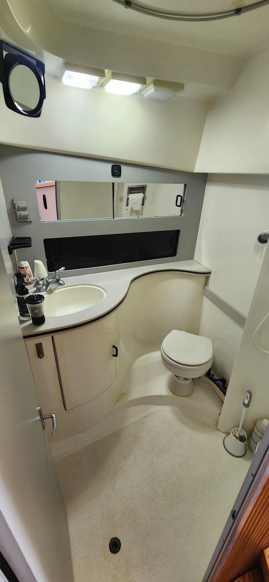 Interior of a 1990 Luhrs 320 yacht, bathroom view.