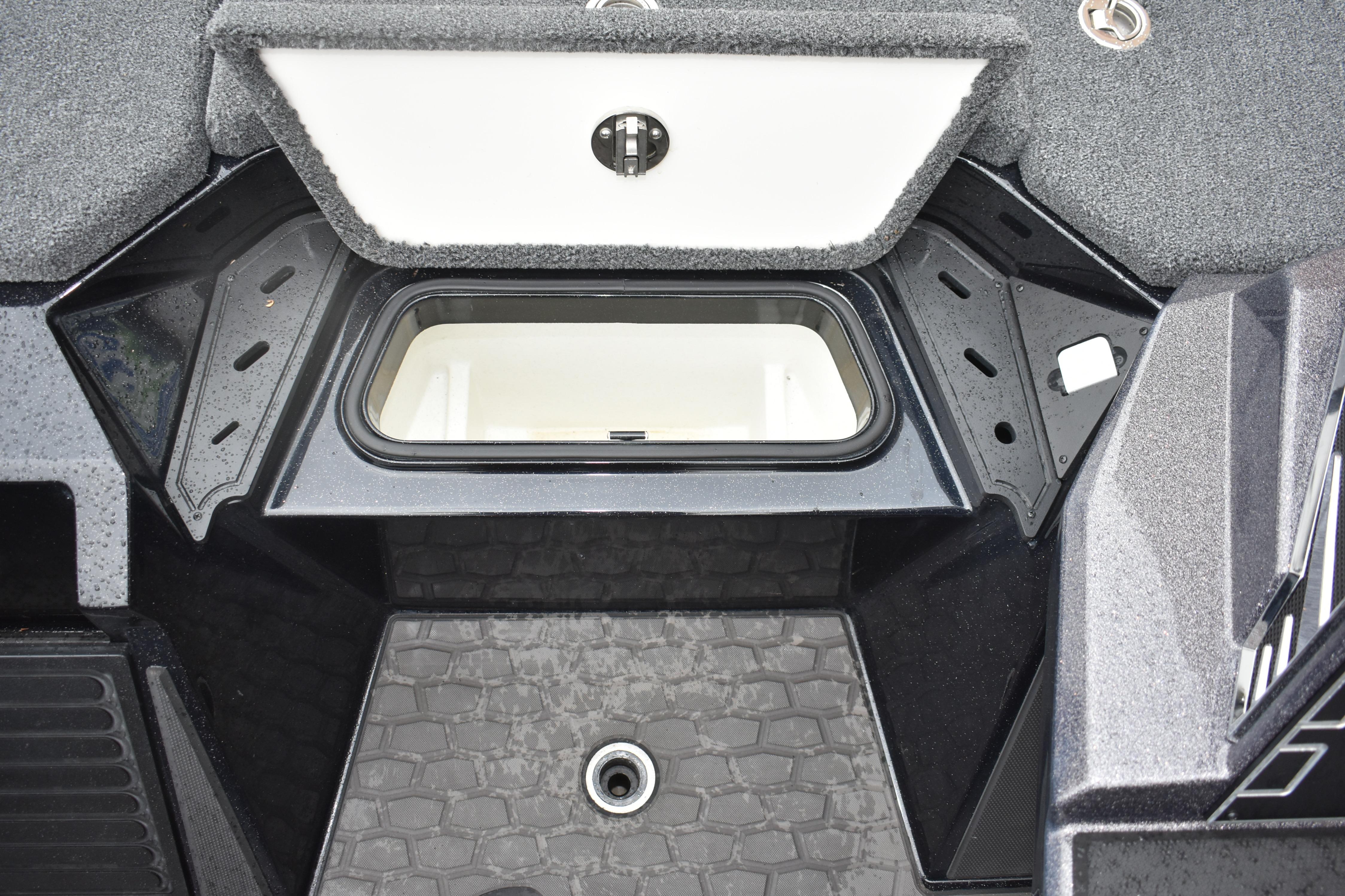 2025 Ranger Z521 boat storage compartment with textured flooring and open hatch.
