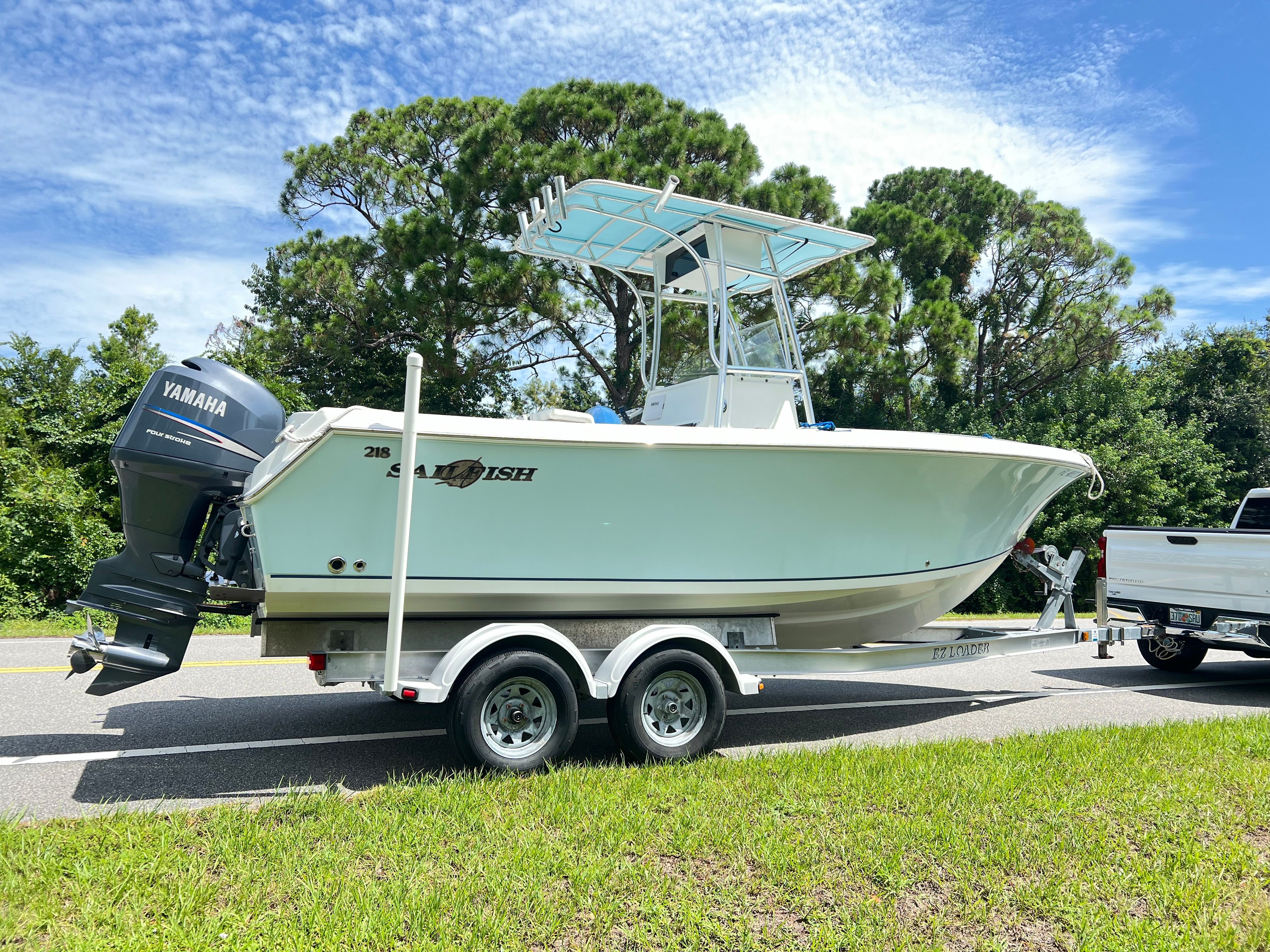 2006 Sailfish 218 CC boat on trailer with Yamaha engine.