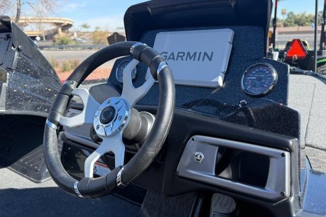 Steering wheel and dashboard of 2026 Nitro Z20 XL Pro boat with Garmin display.