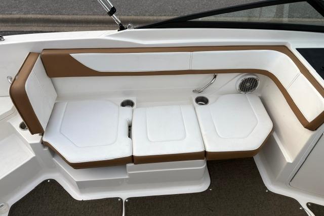 2017 Searay SPX210 boat interior seating with white and brown upholstery.