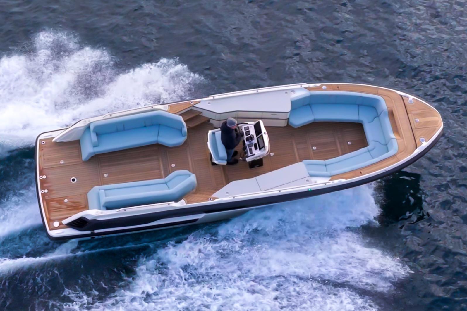 FIM TT9 2026 motorboat cruising on water, luxurious design.