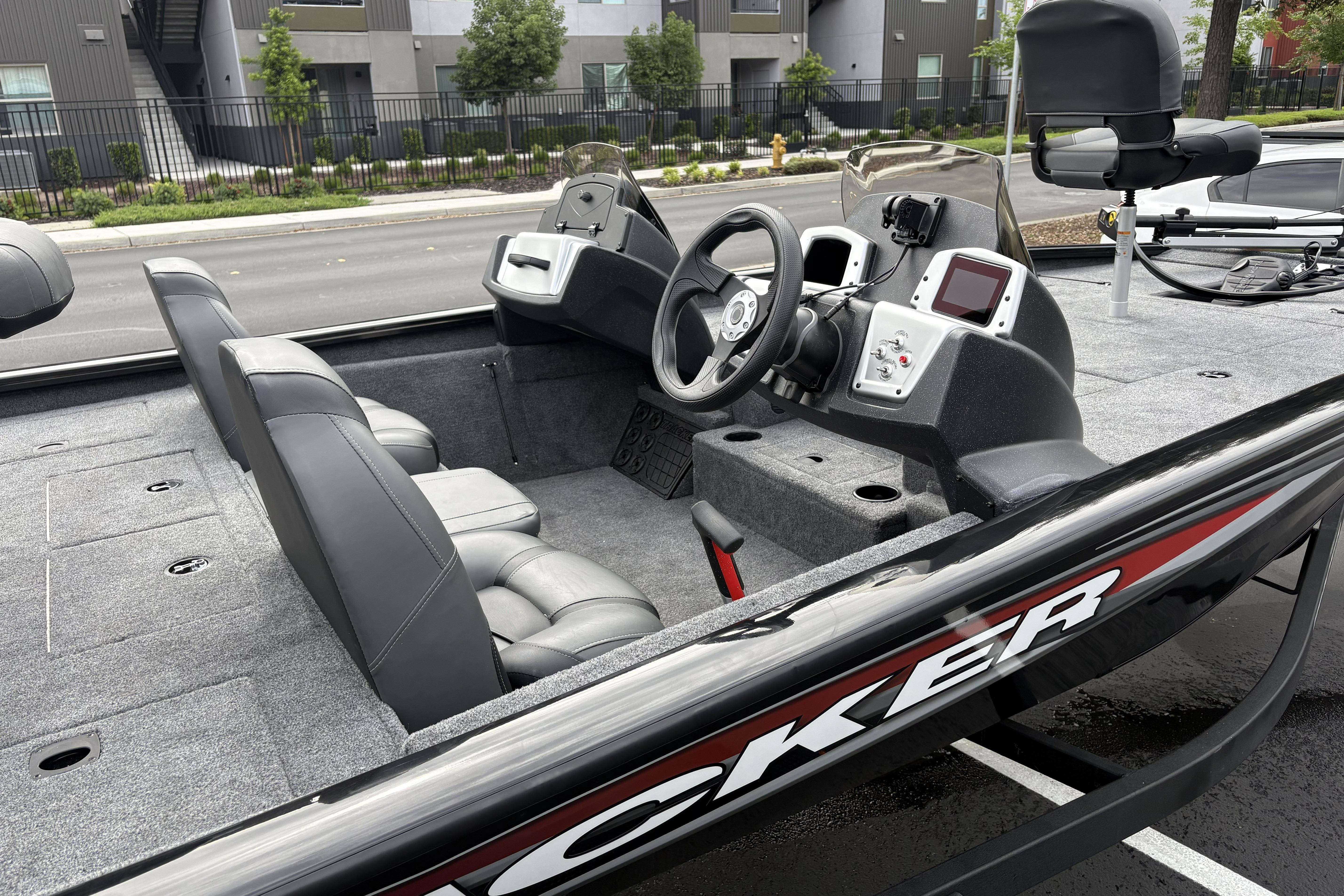 2026 Tracker Pro Team 195 boat interior with steering console and seating.