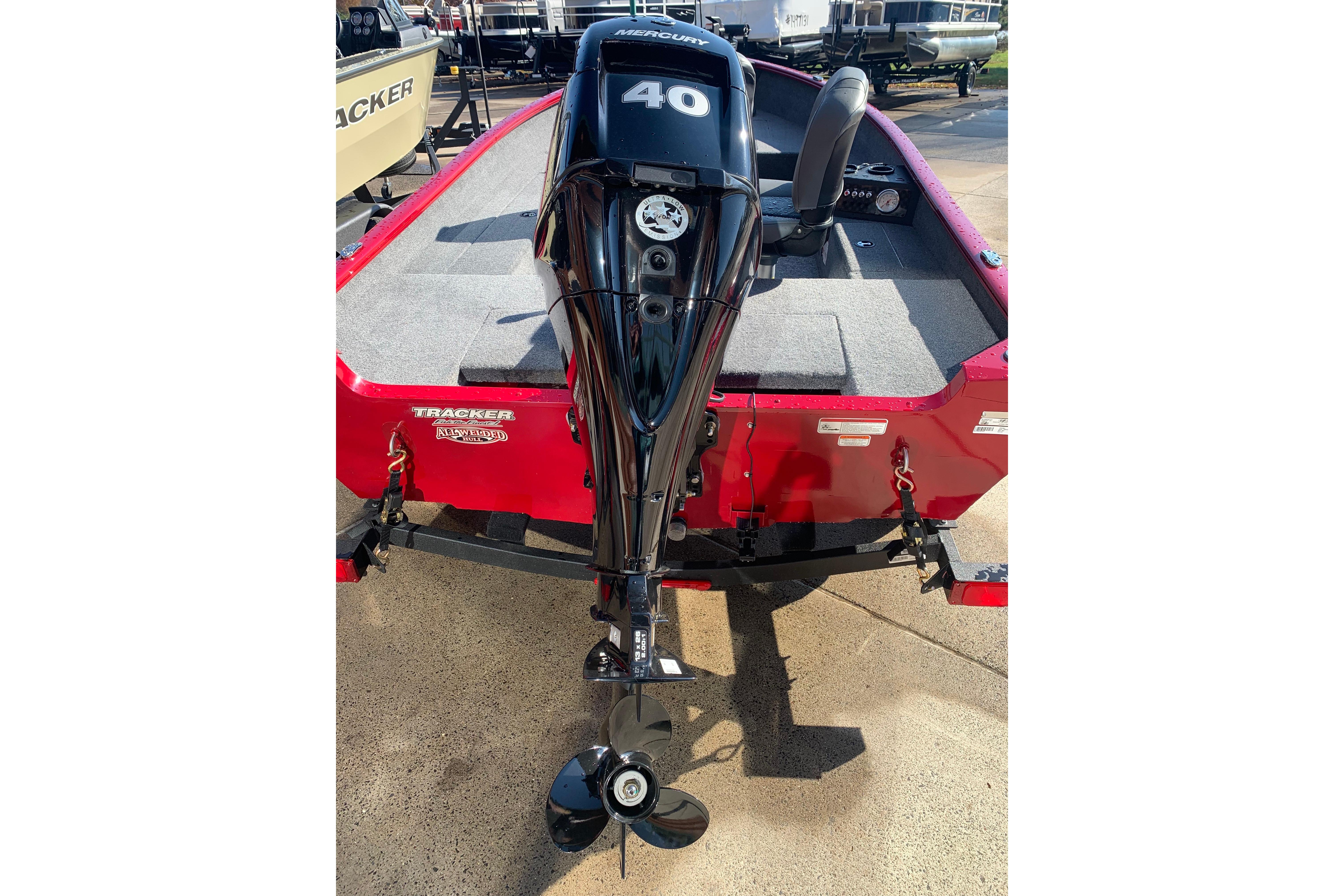 2025 Tracker Super Guide V-16 T boat with Mercury 40 outboard motor, red exterior.