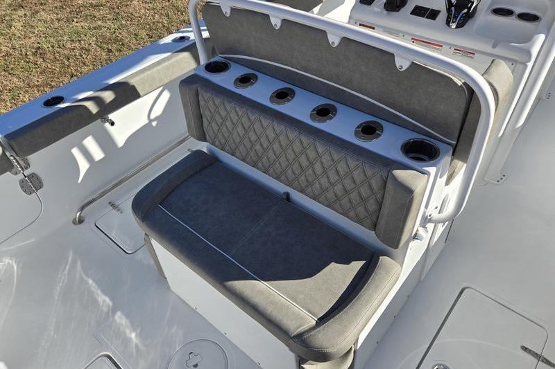 2026 Sea Hunt Ultra 275 Coffin Box boat seating with cup holders and quilted upholstery.
