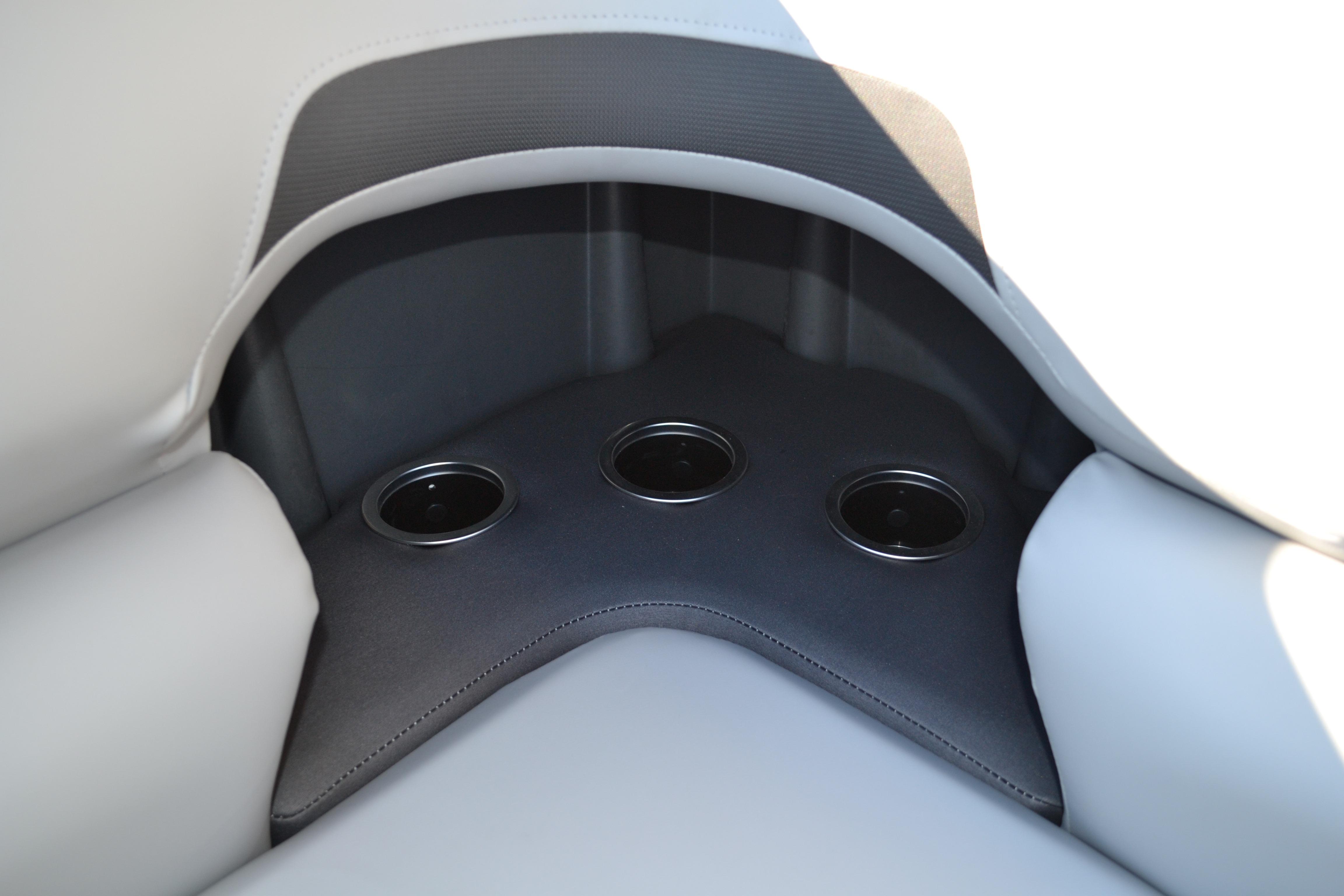 2026 Sun Tracker SportFish 22 XP3 boat interior with three cup holders.
