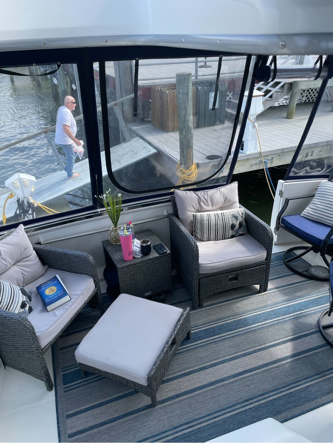 Carver 356 Yacht with cozy seating area at the dock.
