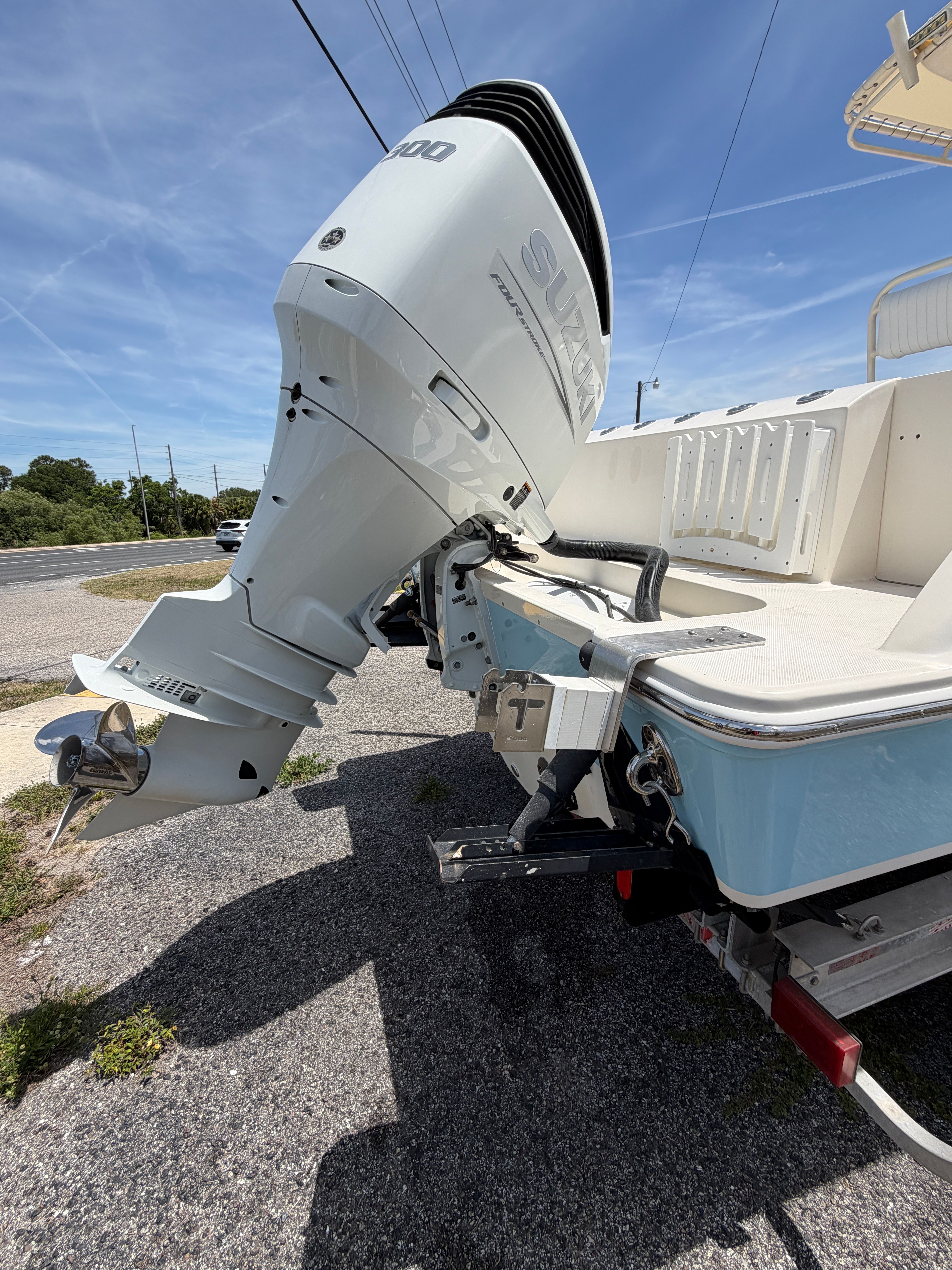McKee Craft 24 FREEDOM boat with Suzuki outboard motor, 2004 model.