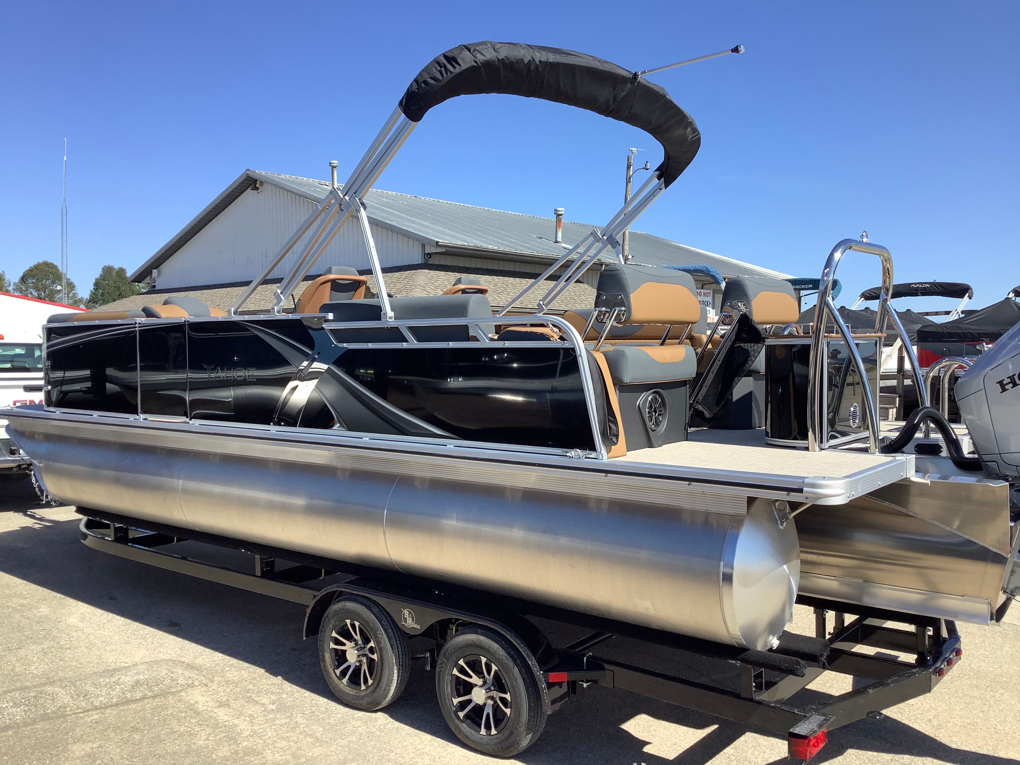 2026 Tahoe 2385 LTZ Quad Lounger Shift pontoon boat on trailer.