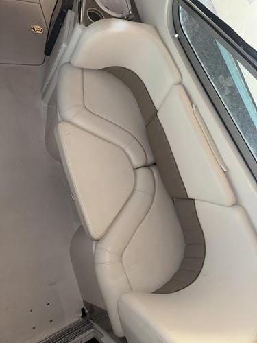 2005 Four Winns 298 Vista boat interior with white leather seating.