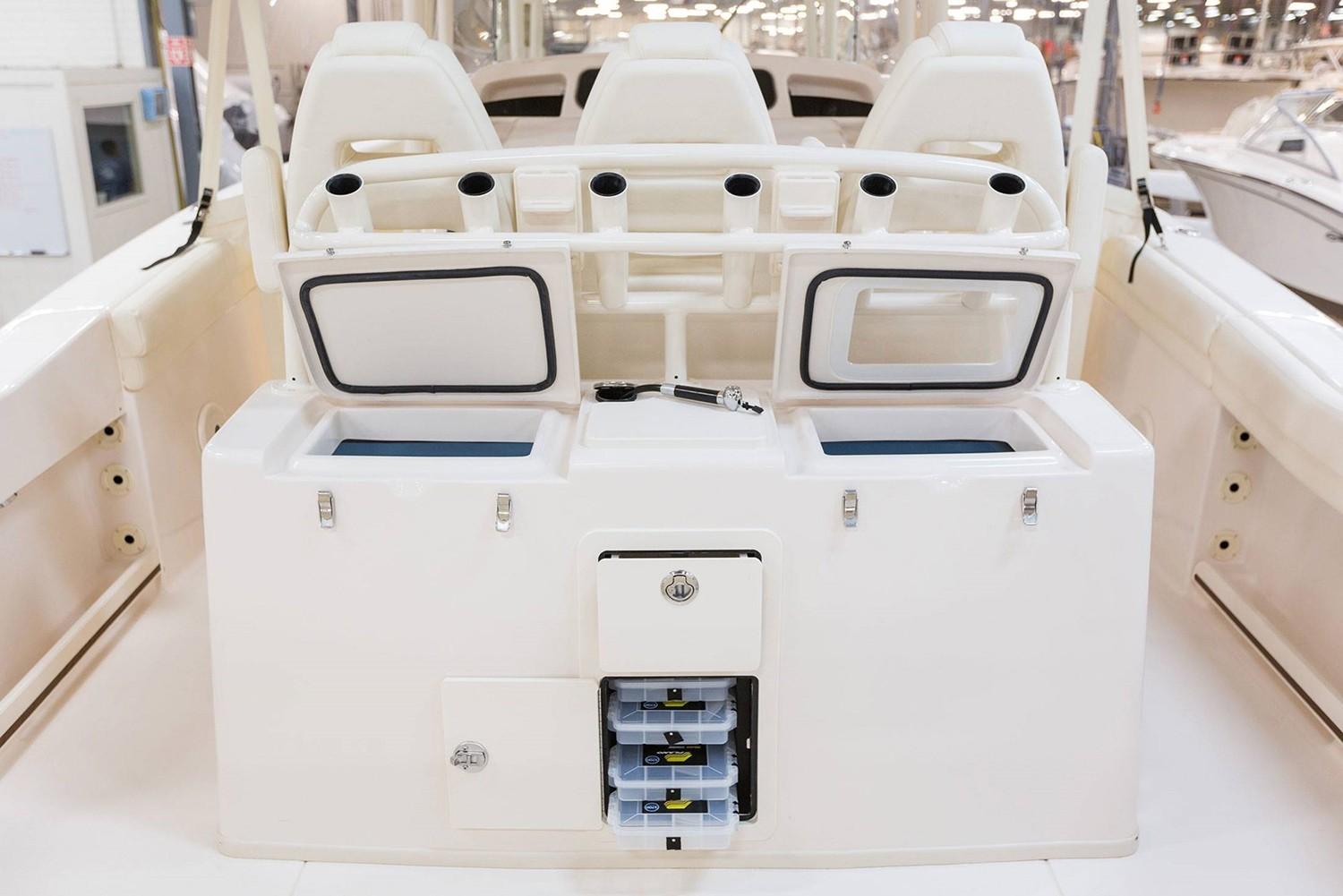 Manufacturer Provided Image: 2019 Grady-White Canyon 336 boat interior with storage compartments and seating.