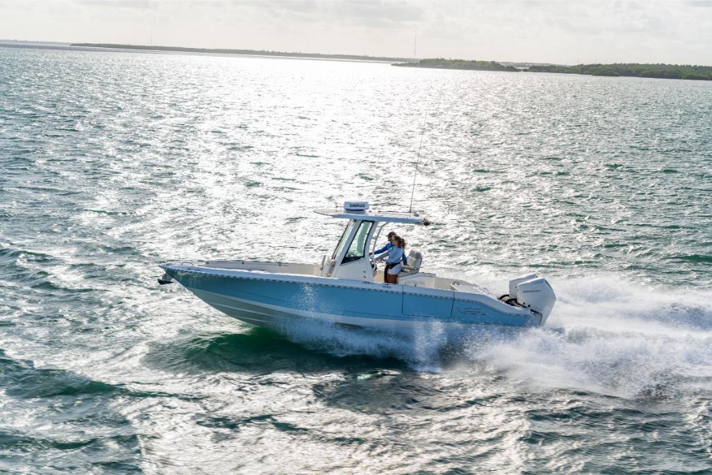 2024 Boston Whaler 280 Dauntless cruising on open water.
