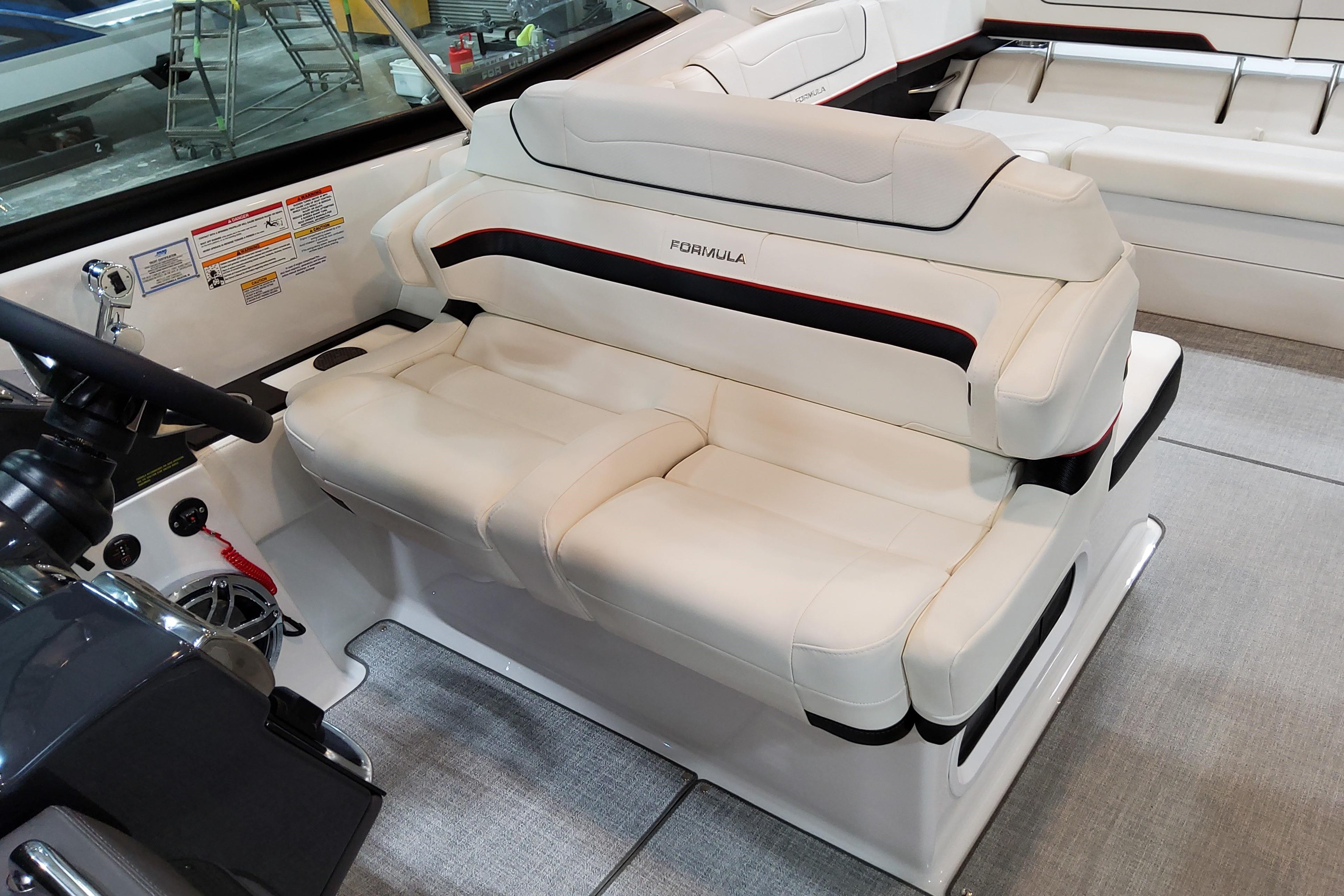 2027 Formula 350 Crossover Bowrider I/O interior with luxurious white seating and modern design.