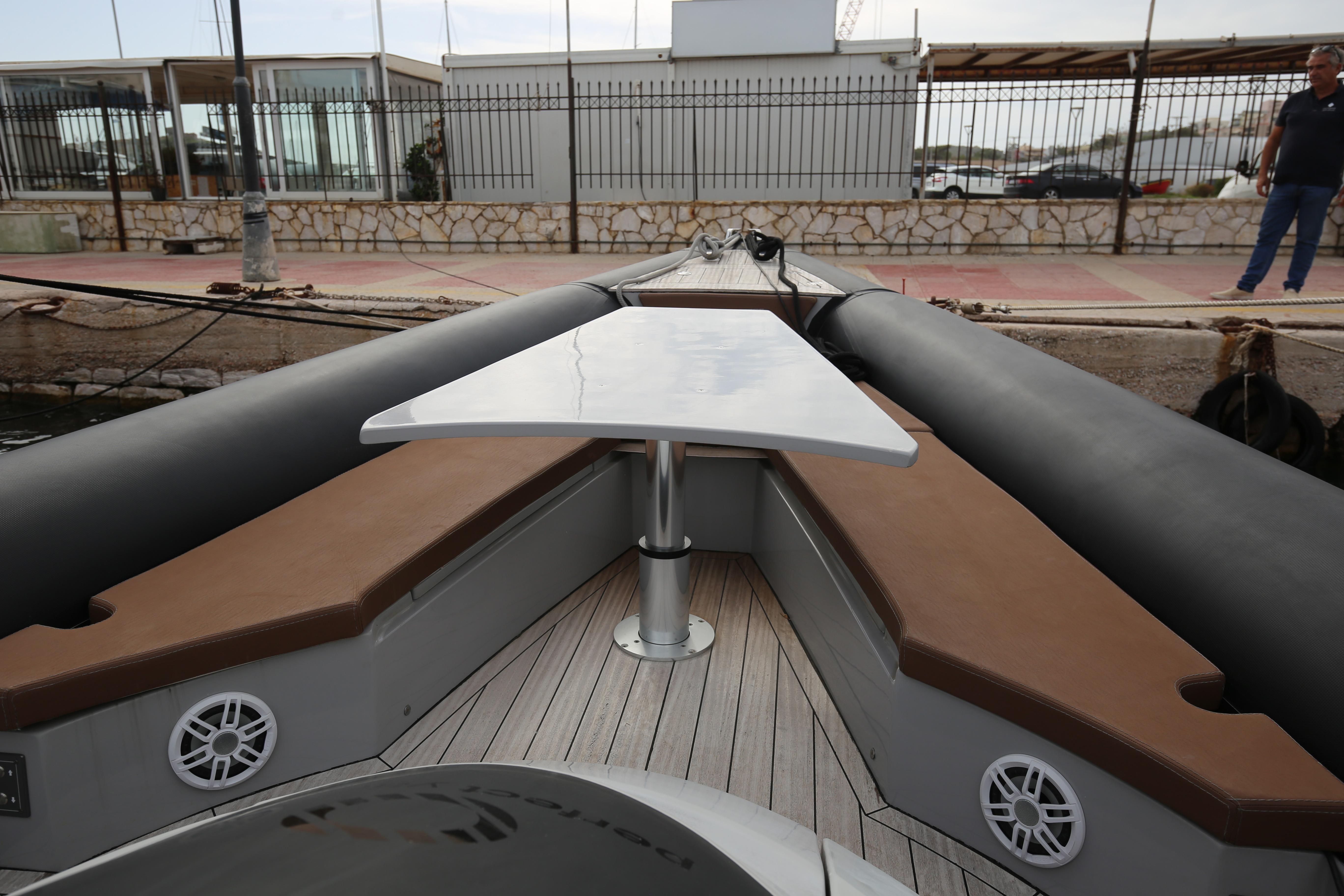 Panamera Yacht PY100, 2021 model, featuring a sleek deck with seating and table.
